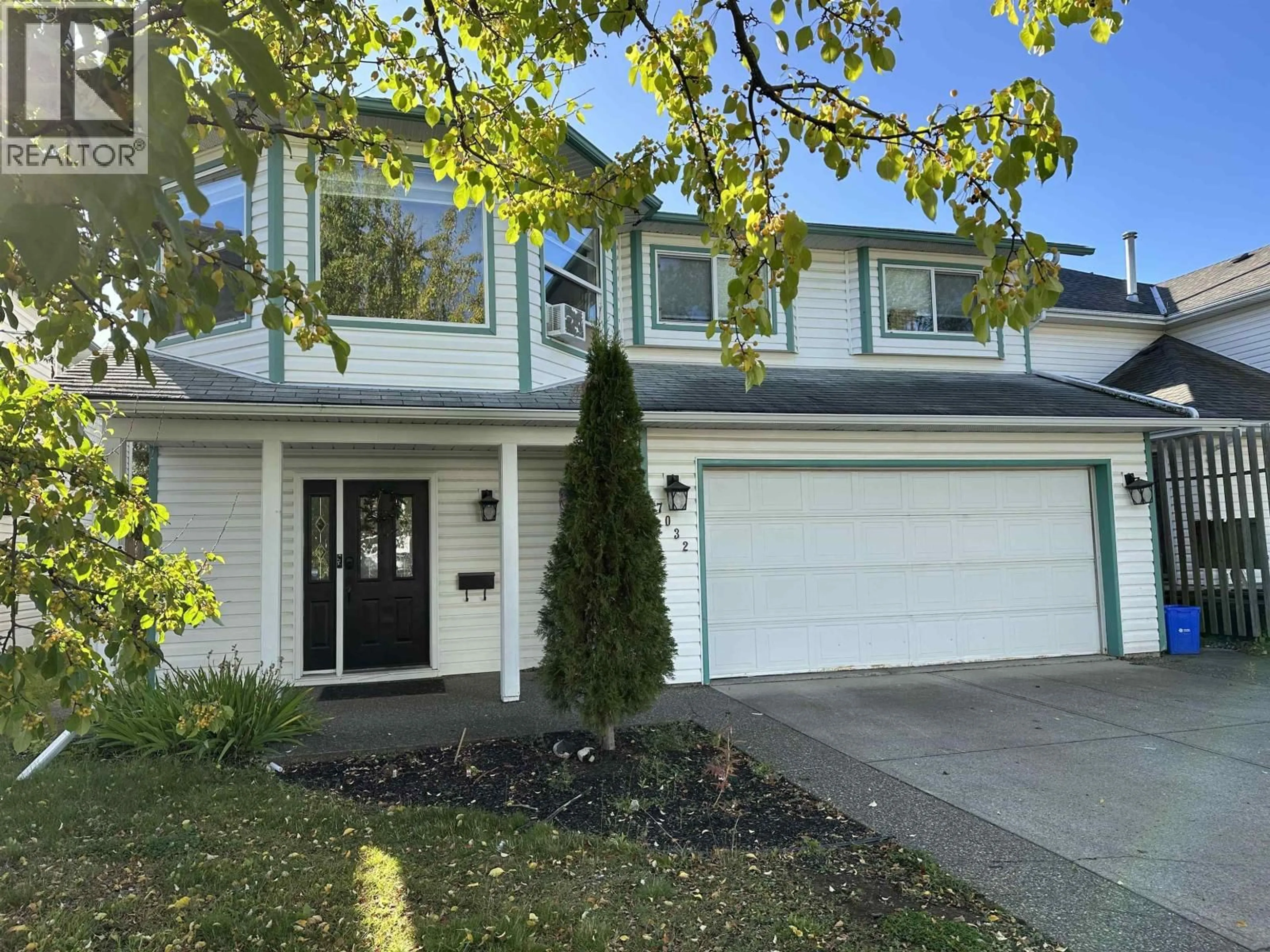 Home with vinyl exterior material, street for 7032 DAKALH TI ROAD, Prince George British Columbia V2N4Y8