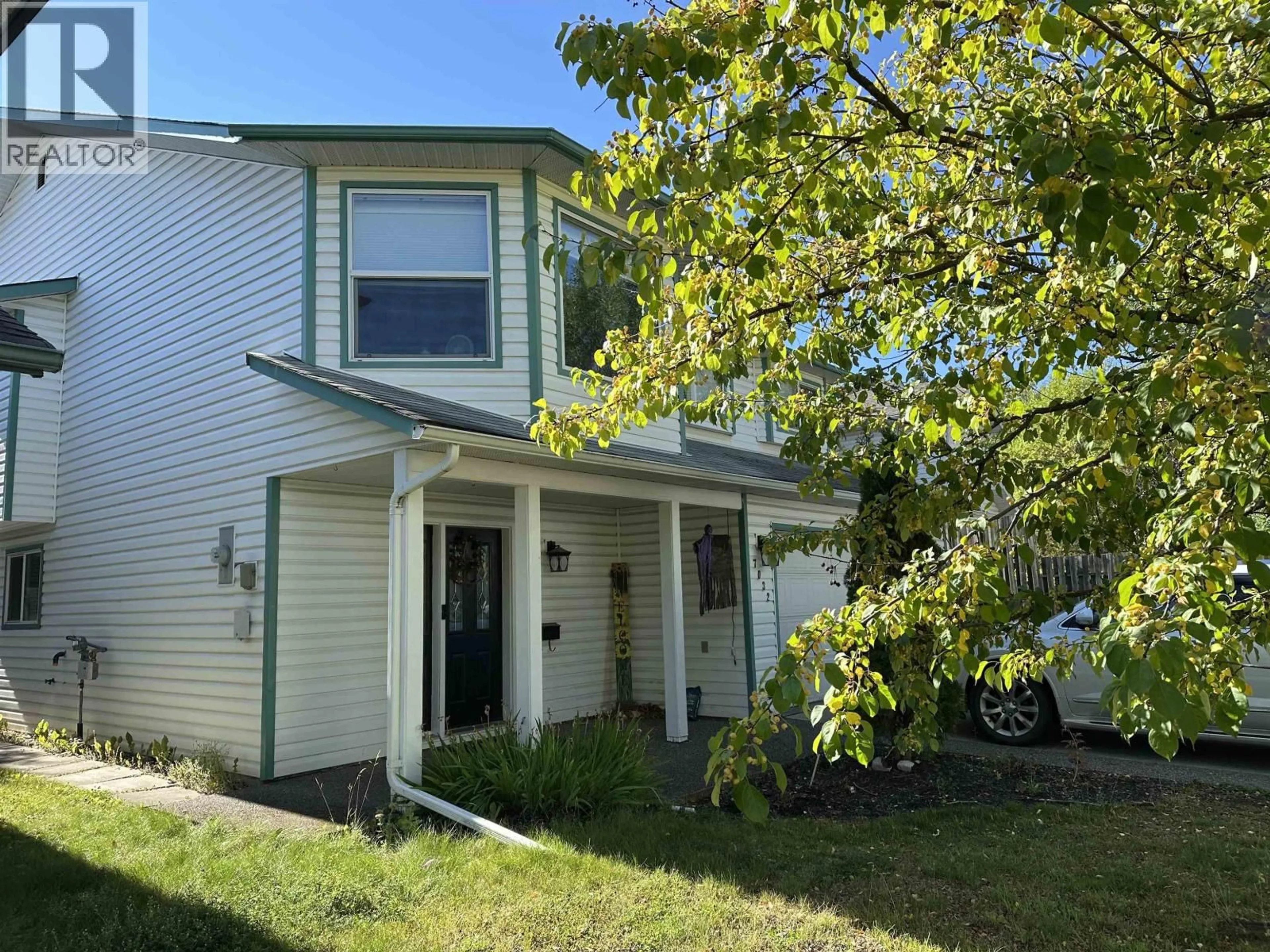 Home with vinyl exterior material, street for 7032 DAKALH TI ROAD, Prince George British Columbia V2N4Y8
