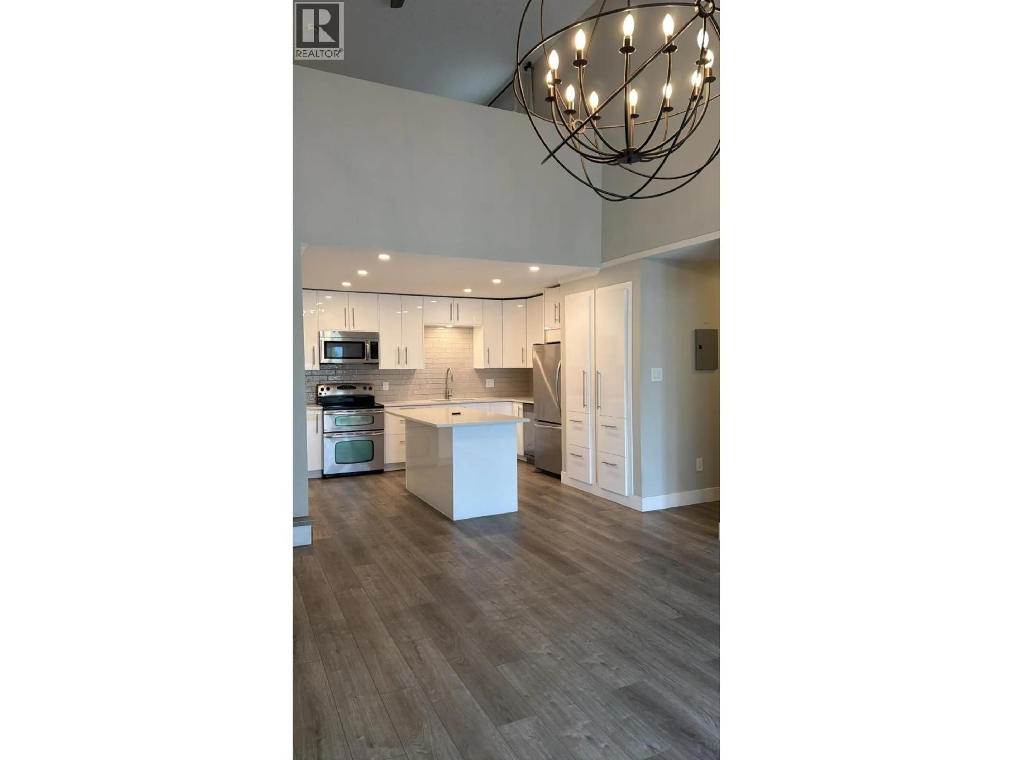 Open concept kitchen, wood/laminate floor for 223 - 1202 LONDON STREET, New Westminster British Columbia V3M5Z6