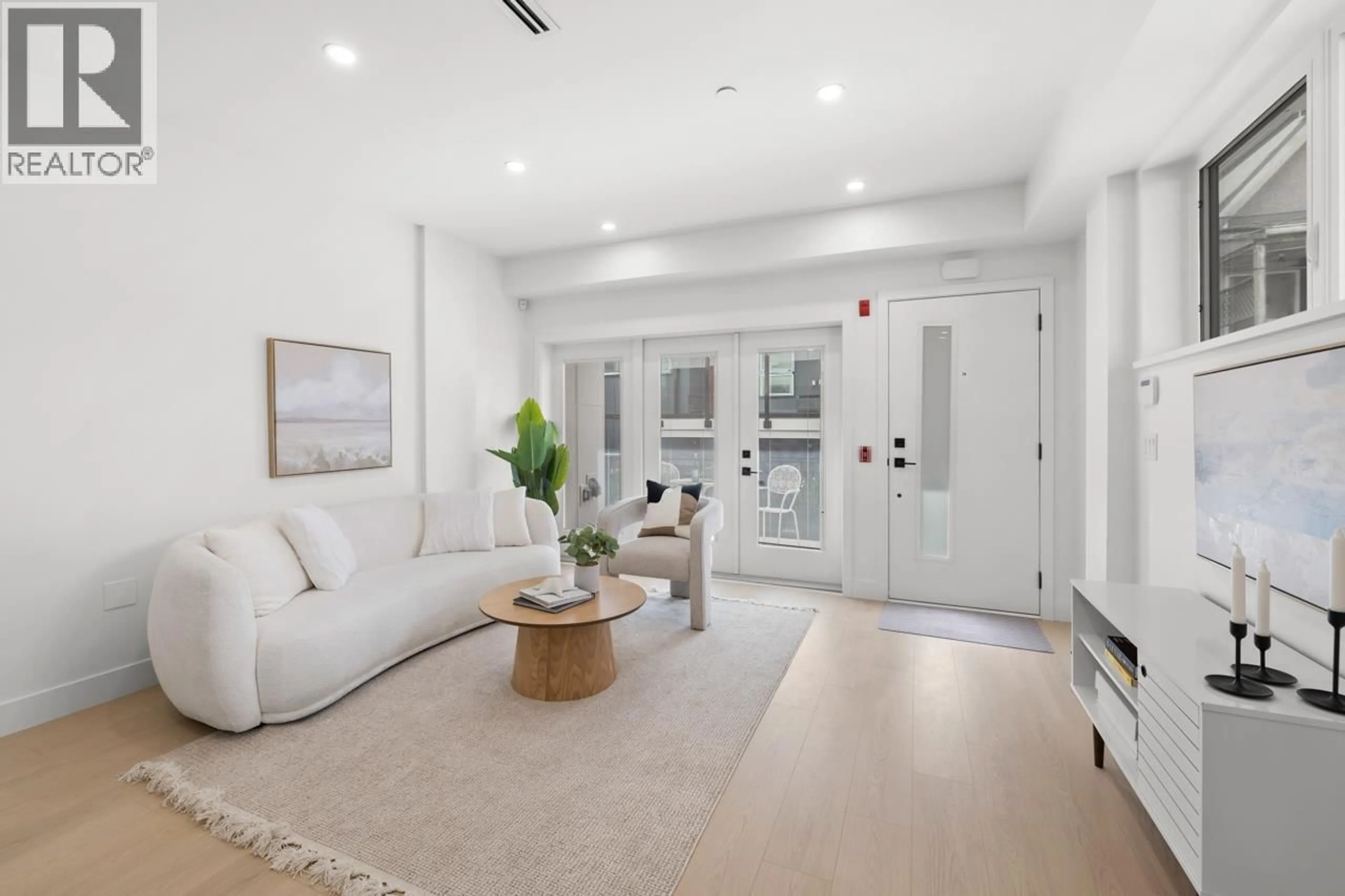 Living room with furniture, unknown for 2133 PENDER STREET, Vancouver British Columbia V5L1X3