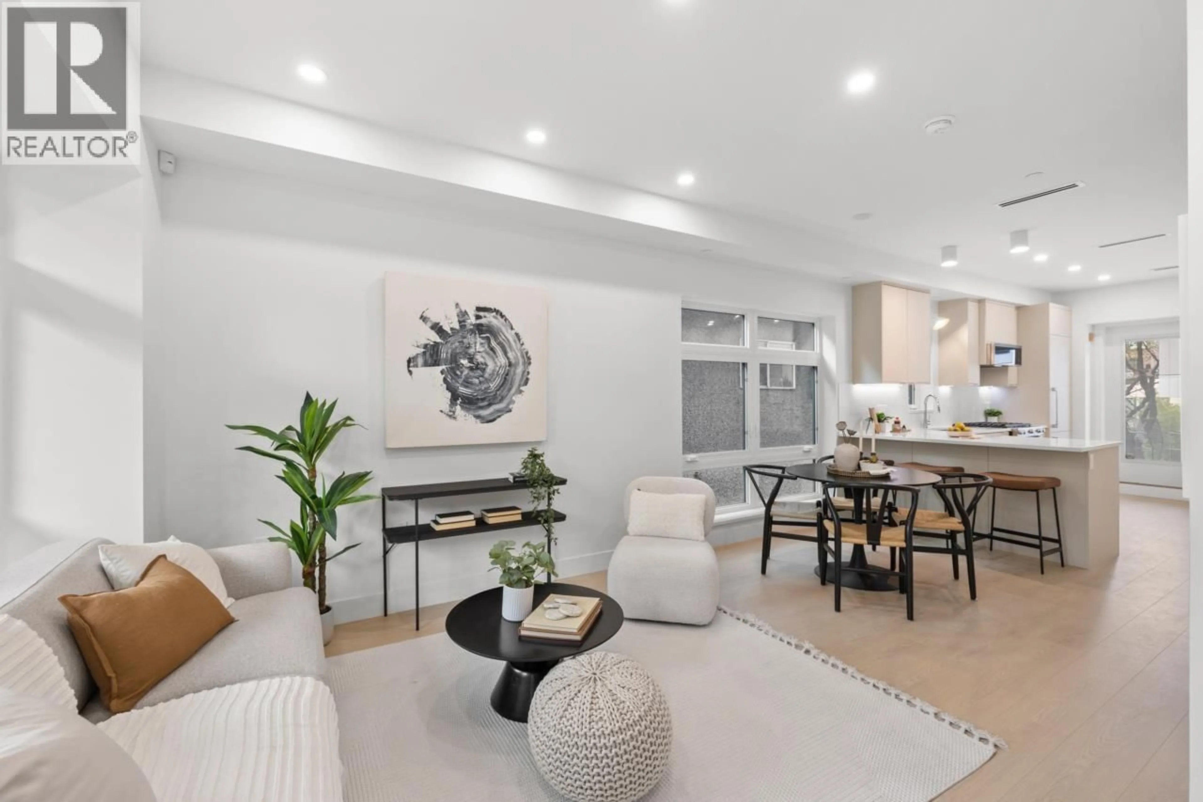Living room with furniture, unknown for 201 - 2135 PENDER STREET, Vancouver British Columbia V5L1X3