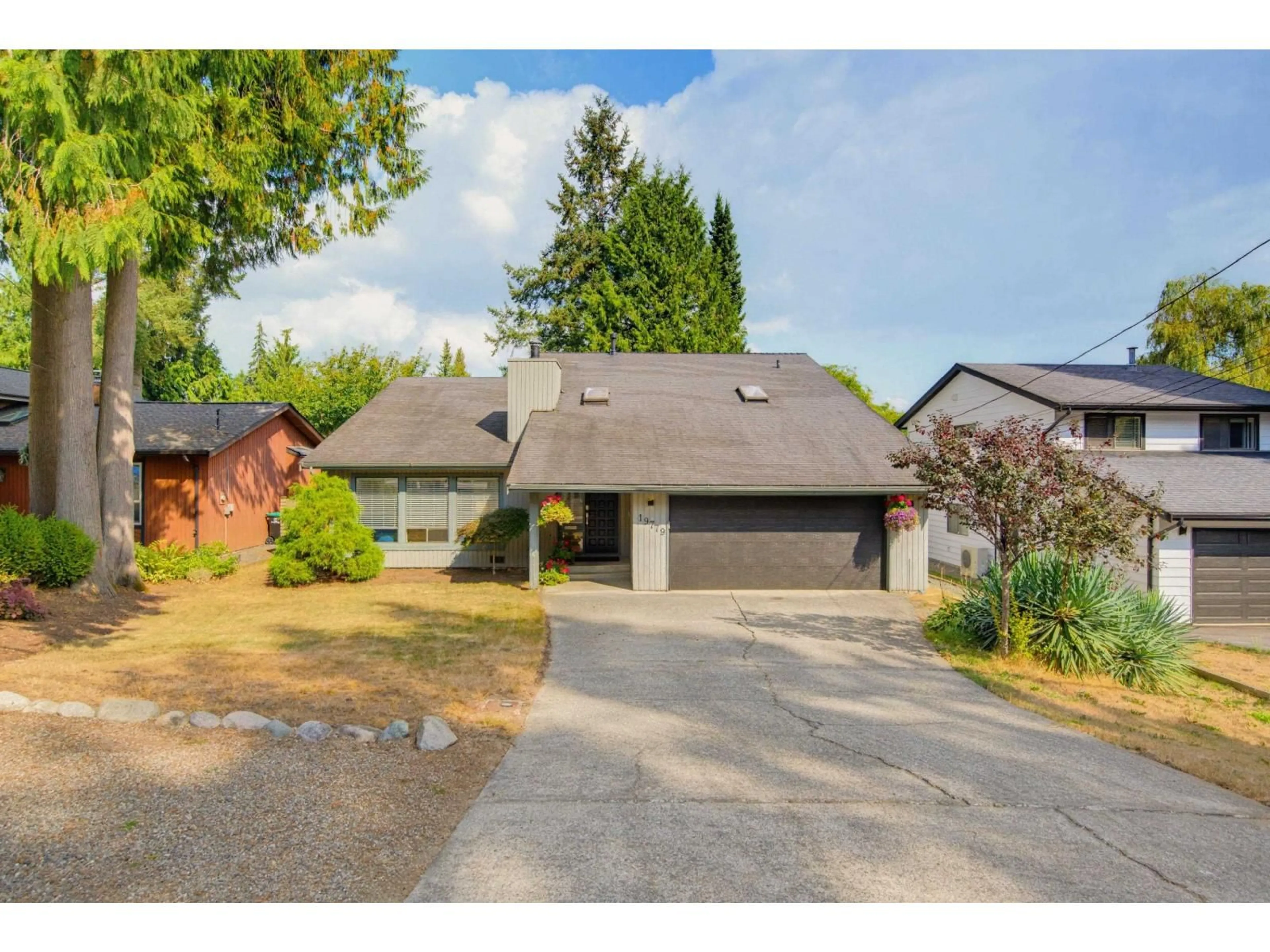 A pic from outside/outdoor area/front of a property/back of a property/a pic from drone, street for 19779 48 AVENUE, Langley British Columbia V3A3L2