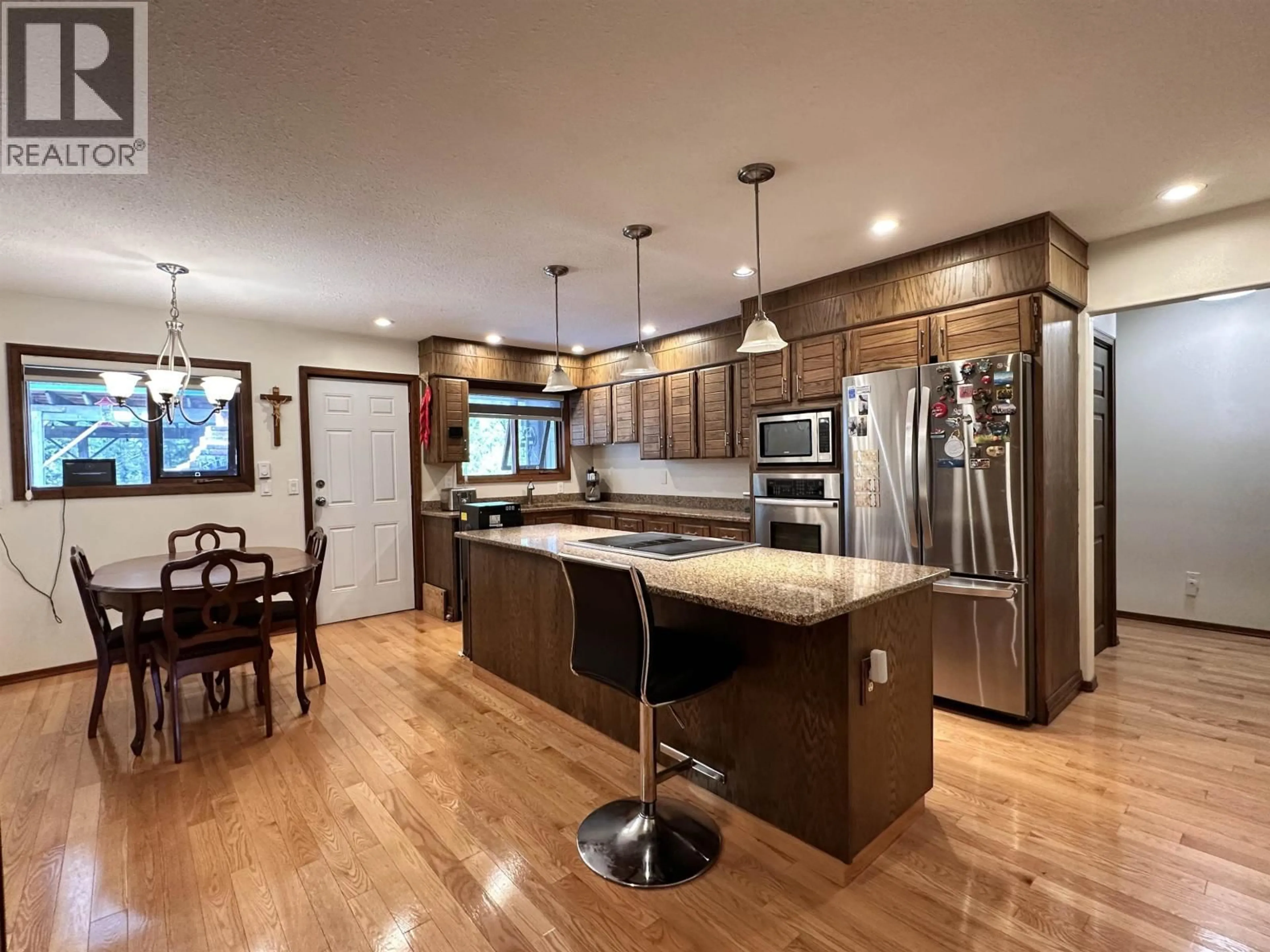 Open concept kitchen, wood/laminate floor for 1365 5 HIGHWAY, Valemount British Columbia V0E2Z0