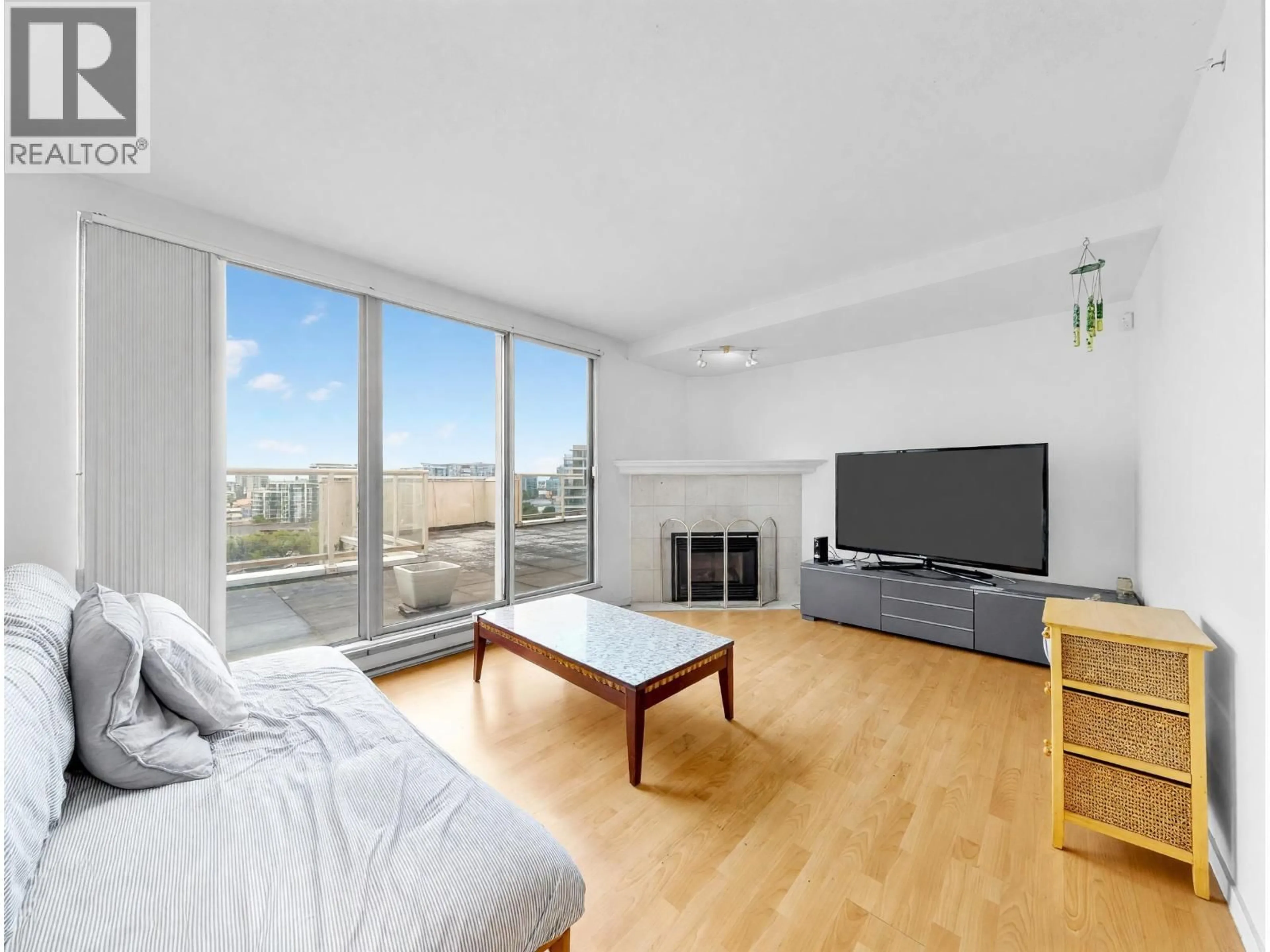 Living room with furniture, wood/laminate floor for 1302 - 8246 LANSDOWNE ROAD, Richmond British Columbia V6X3Y4