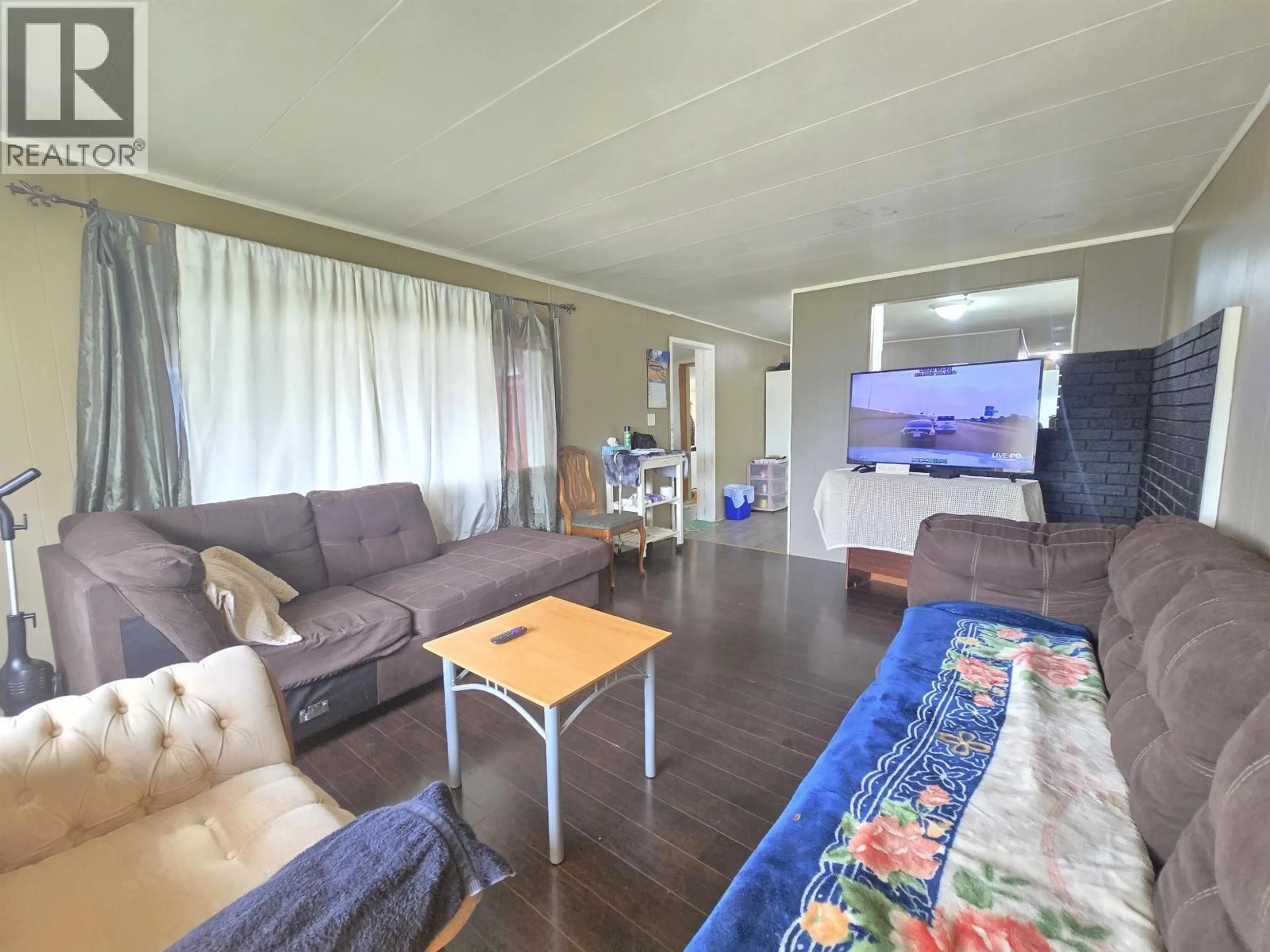 Living room with furniture, wood/laminate floor for 14 - 950 ANDERSON DRIVE, Quesnel British Columbia V2J1G5