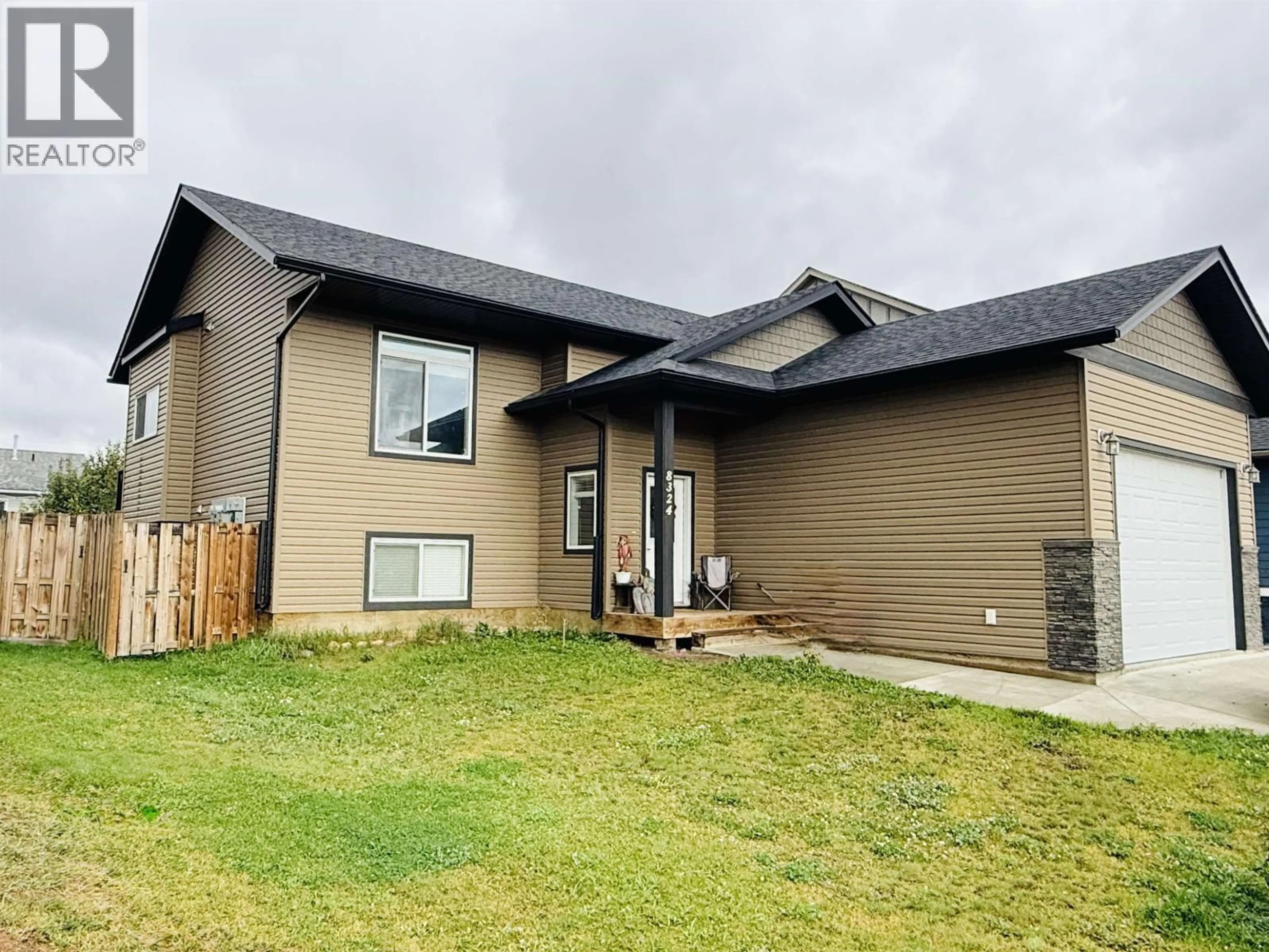 Home with vinyl exterior material, street for 8324 88 AVENUE, Fort St. John British Columbia V1J0S2