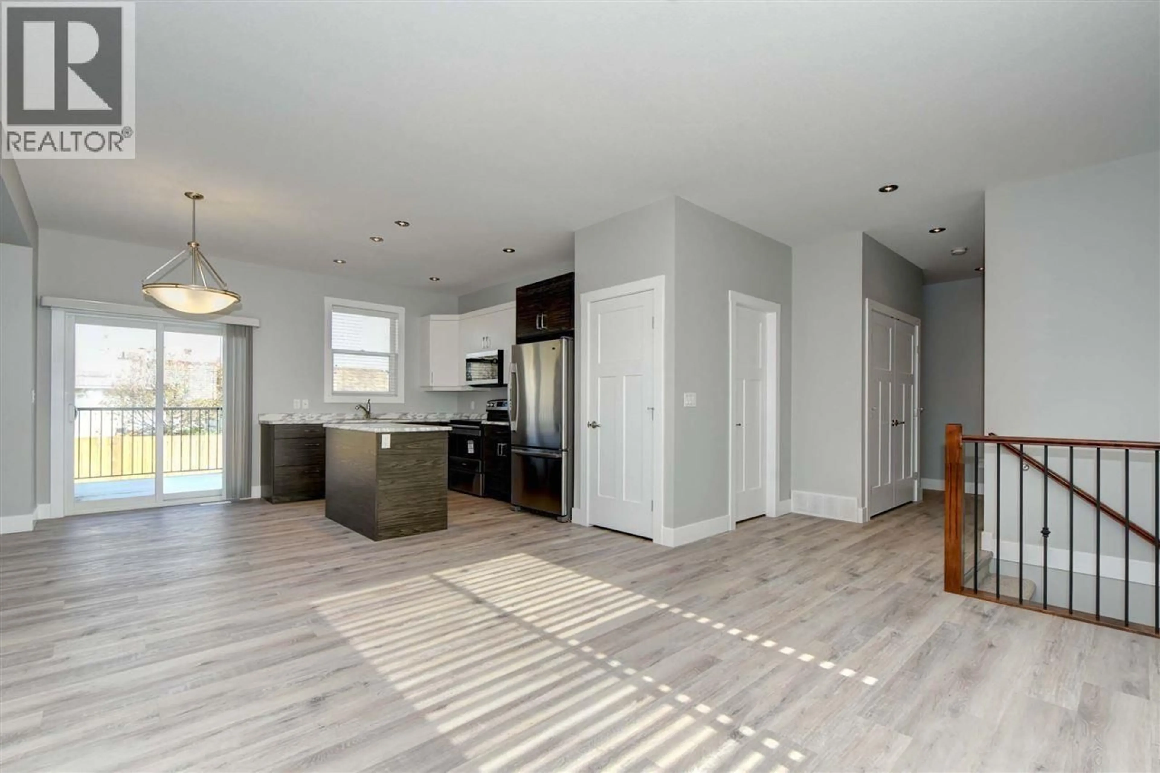 Open concept kitchen, unknown for 8324 88 AVENUE, Fort St. John British Columbia V1J0S2