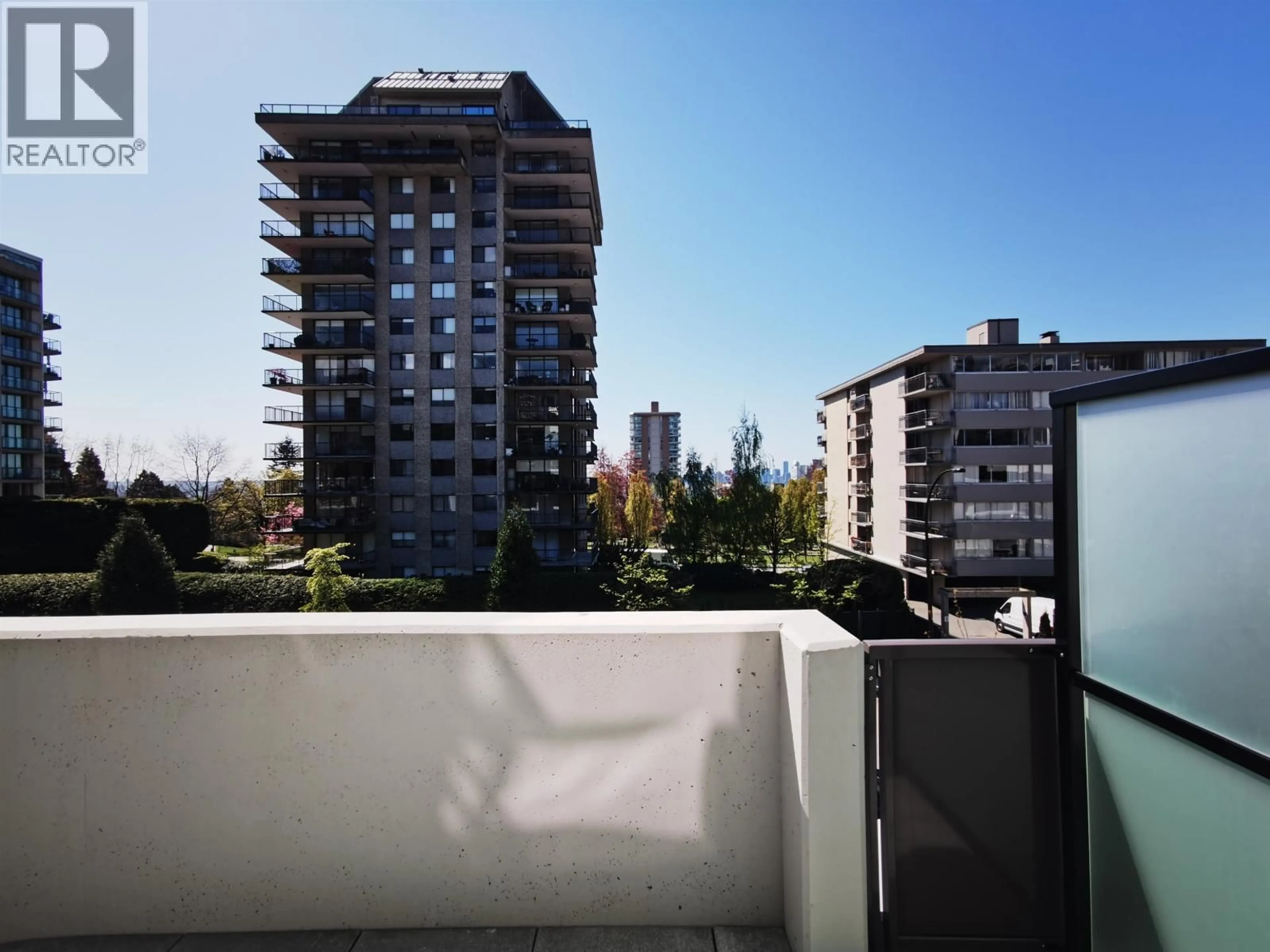 Balcony in the apartment, city buildings view from balcony for 203 - 108 8TH STREET, North Vancouver British Columbia V7L0H1
