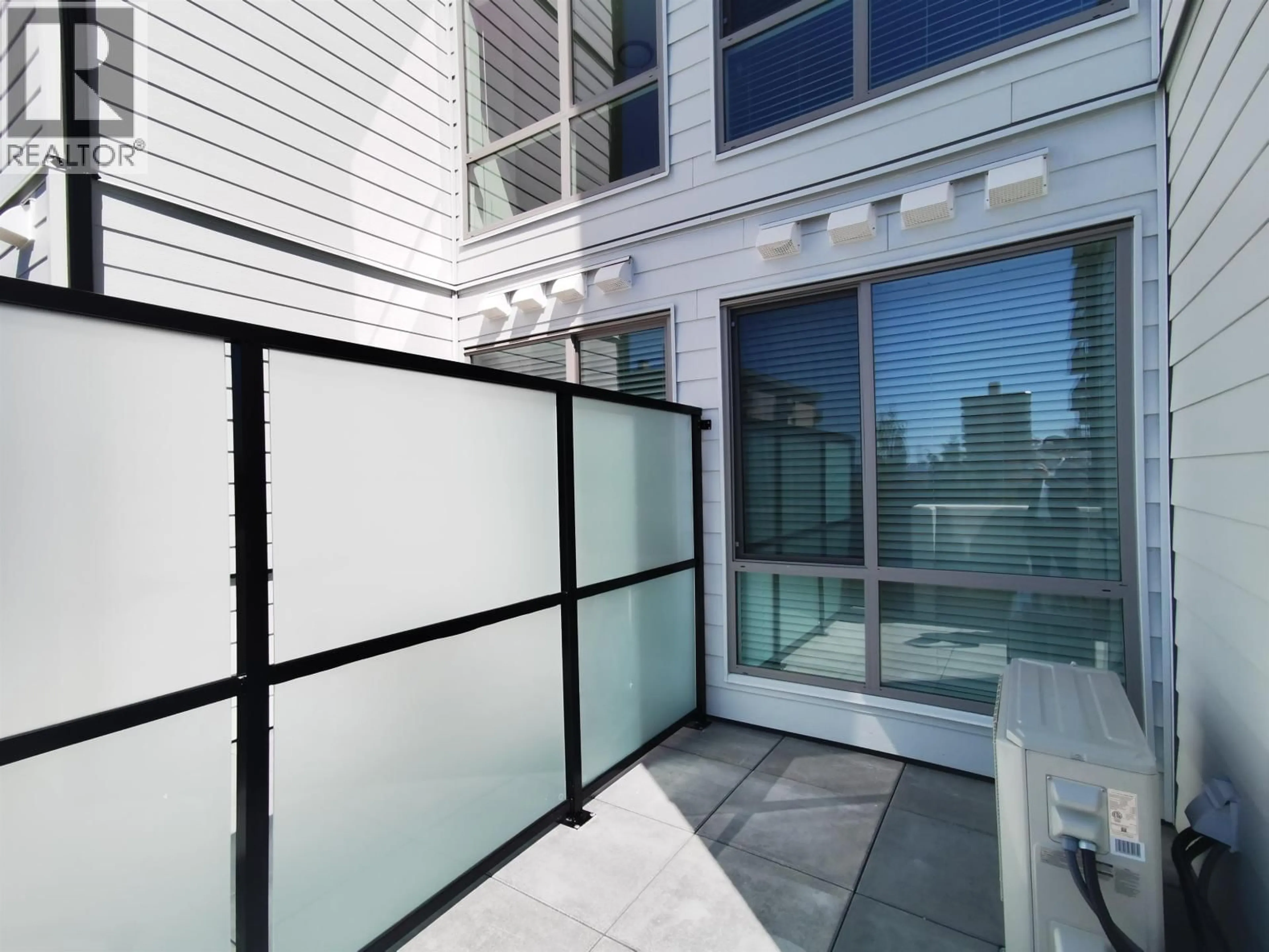 Balcony in the apartment, unknown for 203 - 108 8TH STREET, North Vancouver British Columbia V7L0H1