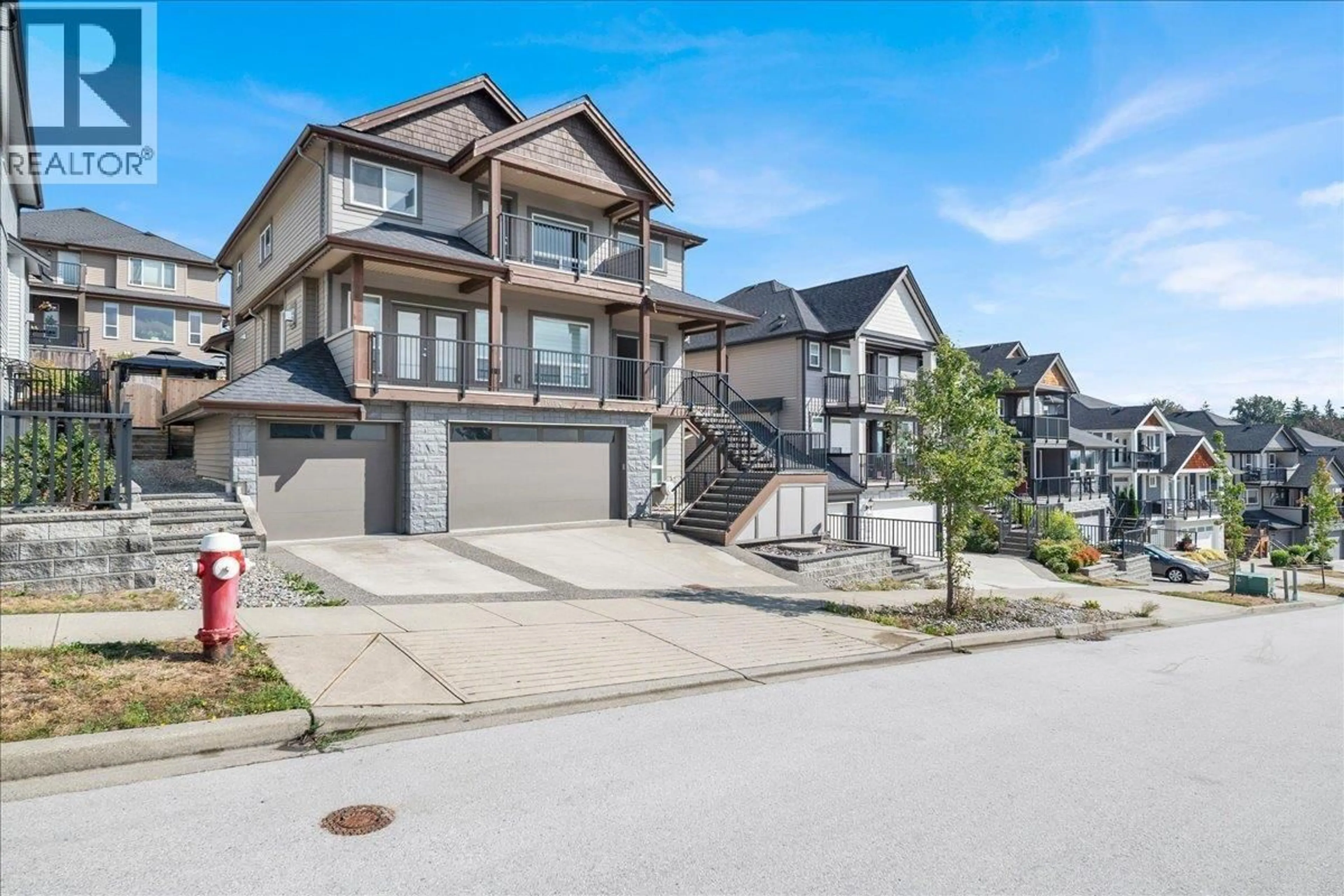A pic from outside/outdoor area/front of a property/back of a property/a pic from drone, street for 10154 247 STREET, Maple Ridge British Columbia V2W0H1