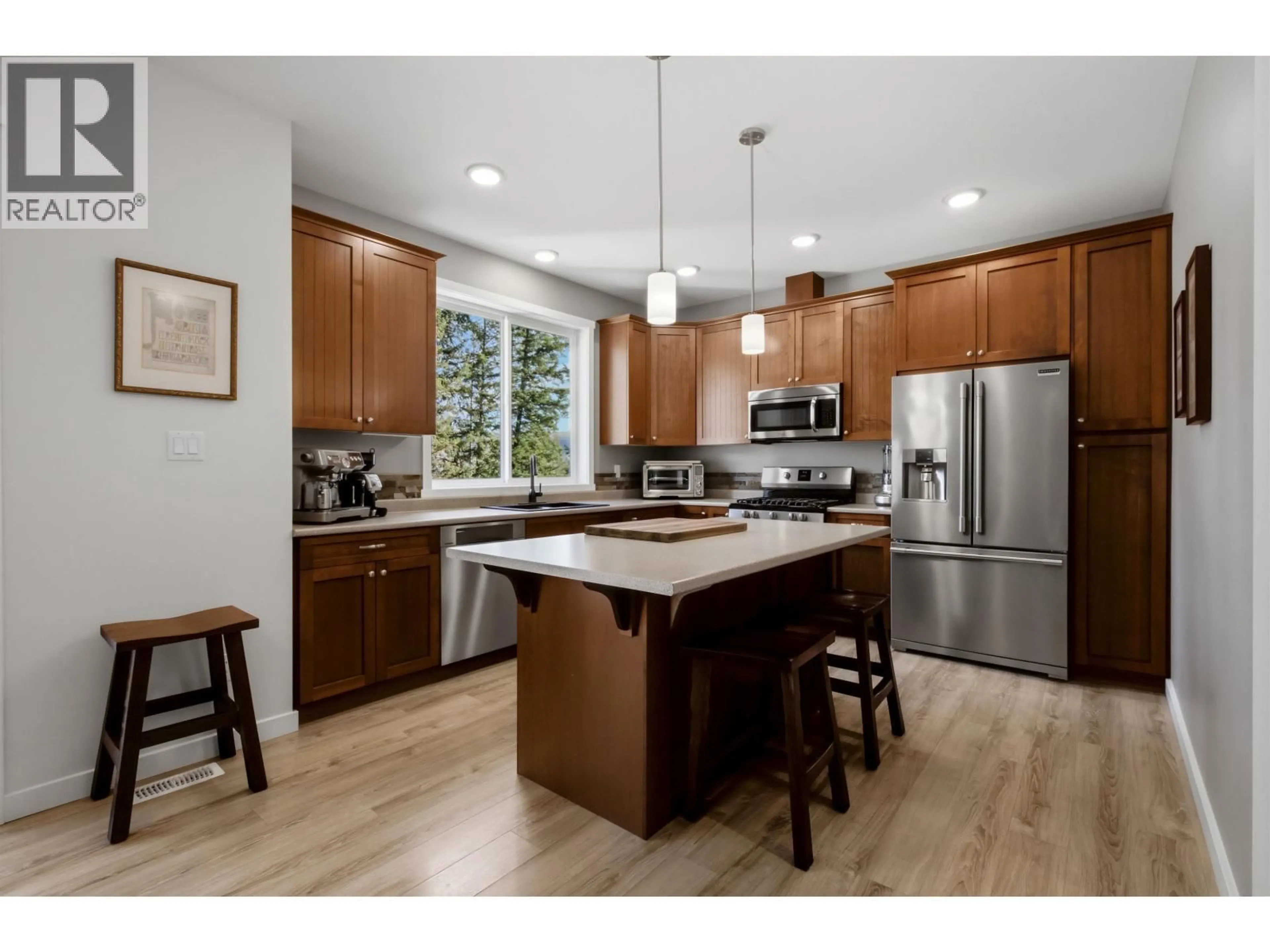 Open concept kitchen, wood/laminate floor for 2050 SOUTH LAKESIDE DRIVE, Williams Lake British Columbia V2G5H4