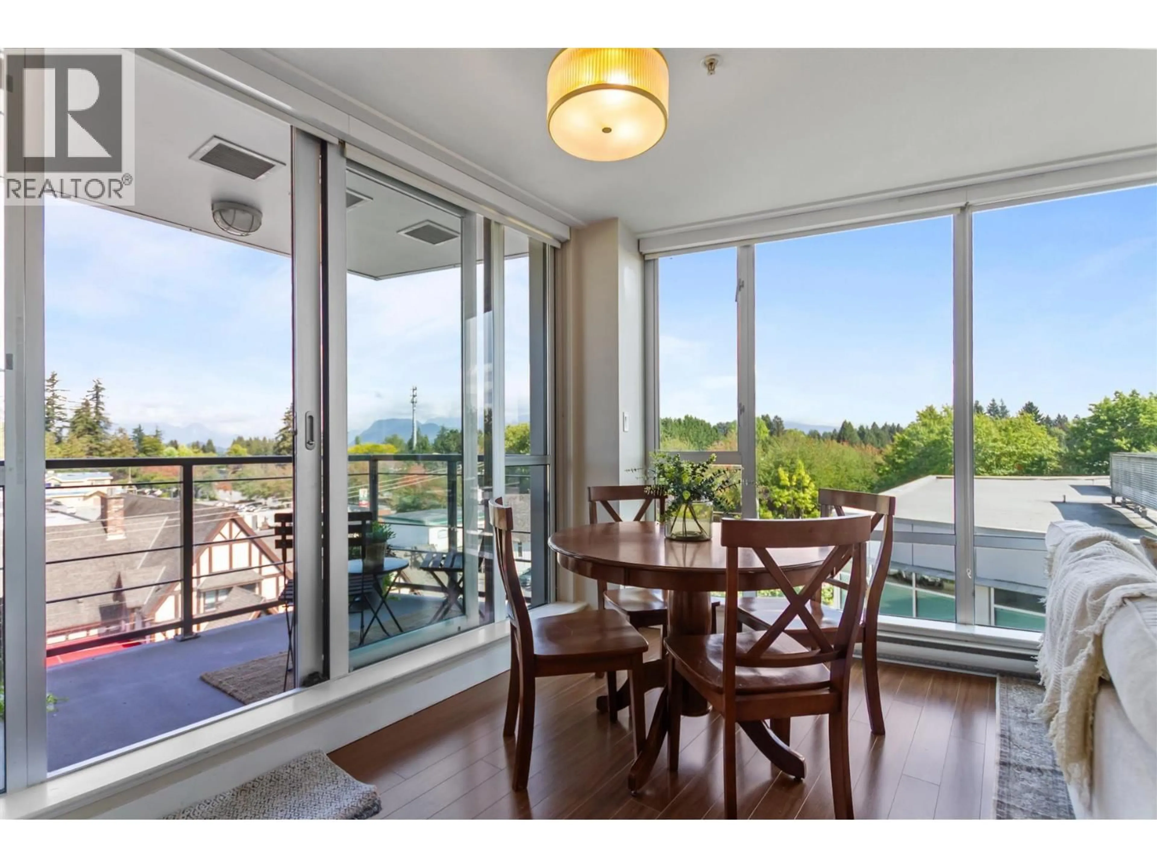 Dining room, wood/laminate floor for 501 - 12069 HARRIS ROAD, Pitt Meadows British Columbia V3Y0C8
