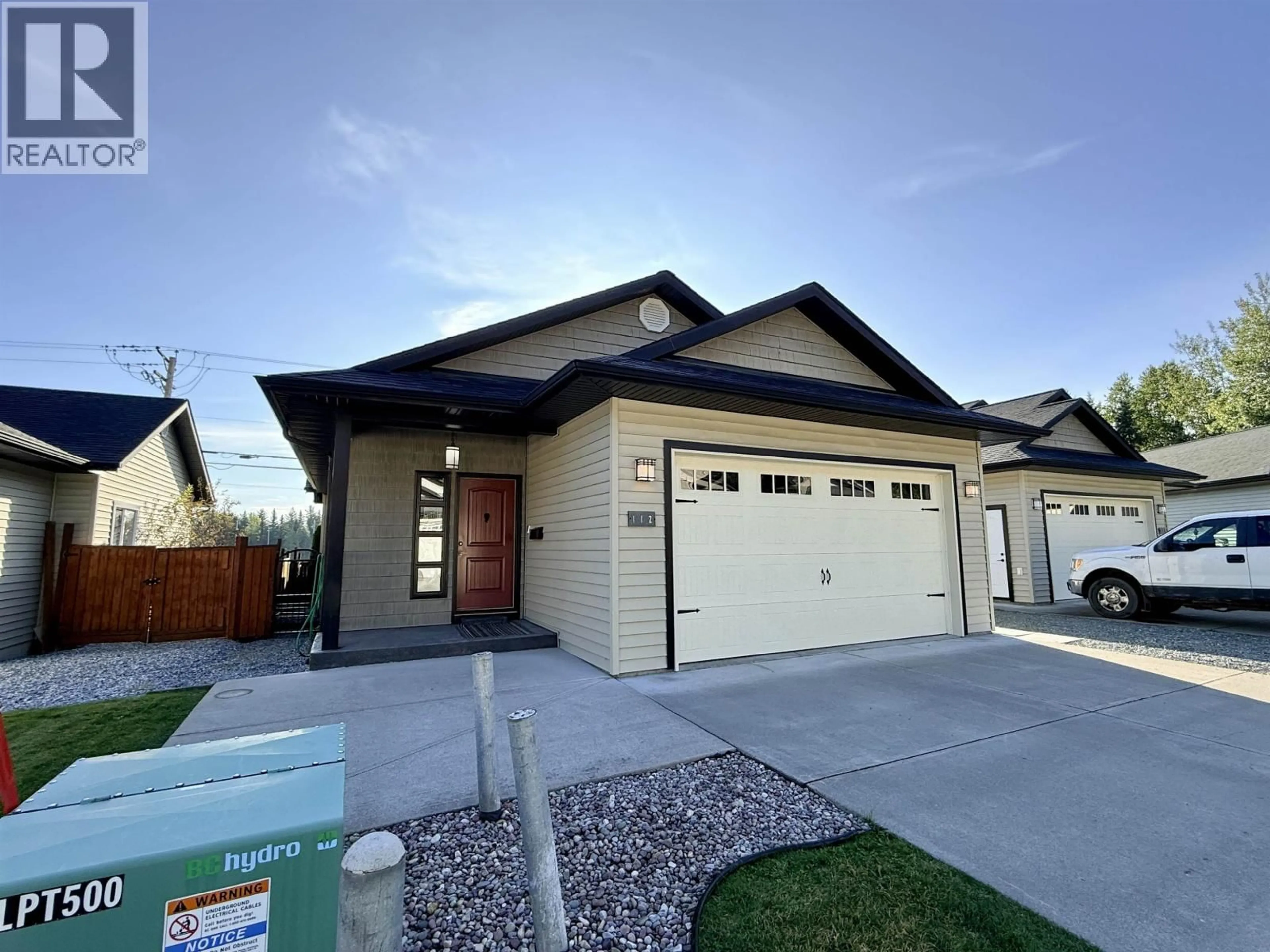 Home with vinyl exterior material, street for 112 - 6525 DOMANO BOULEVARD, Prince George British Columbia V2N0C9