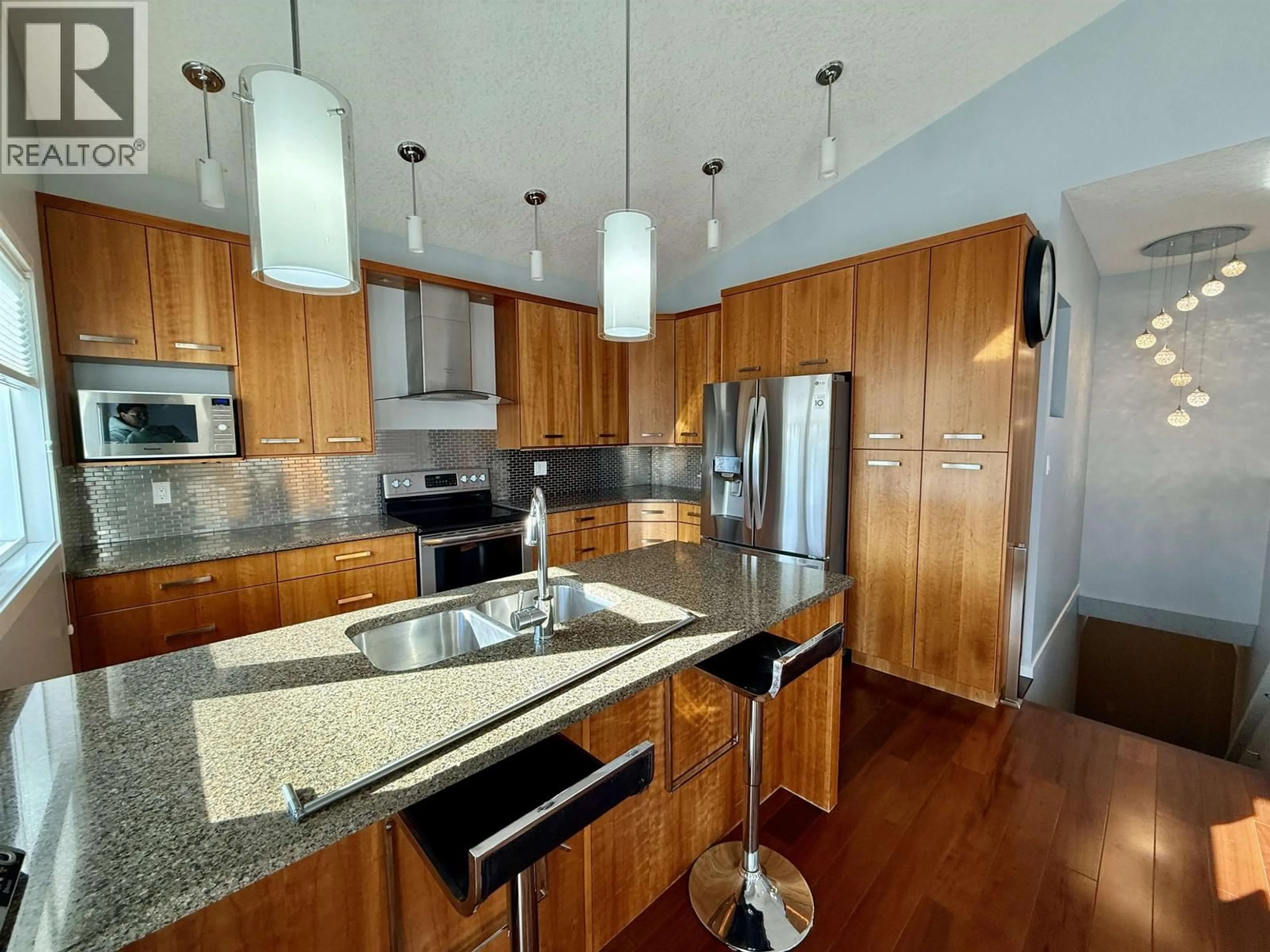 Contemporary kitchen, wood/laminate floor for 112 - 6525 DOMANO BOULEVARD, Prince George British Columbia V2N0C9