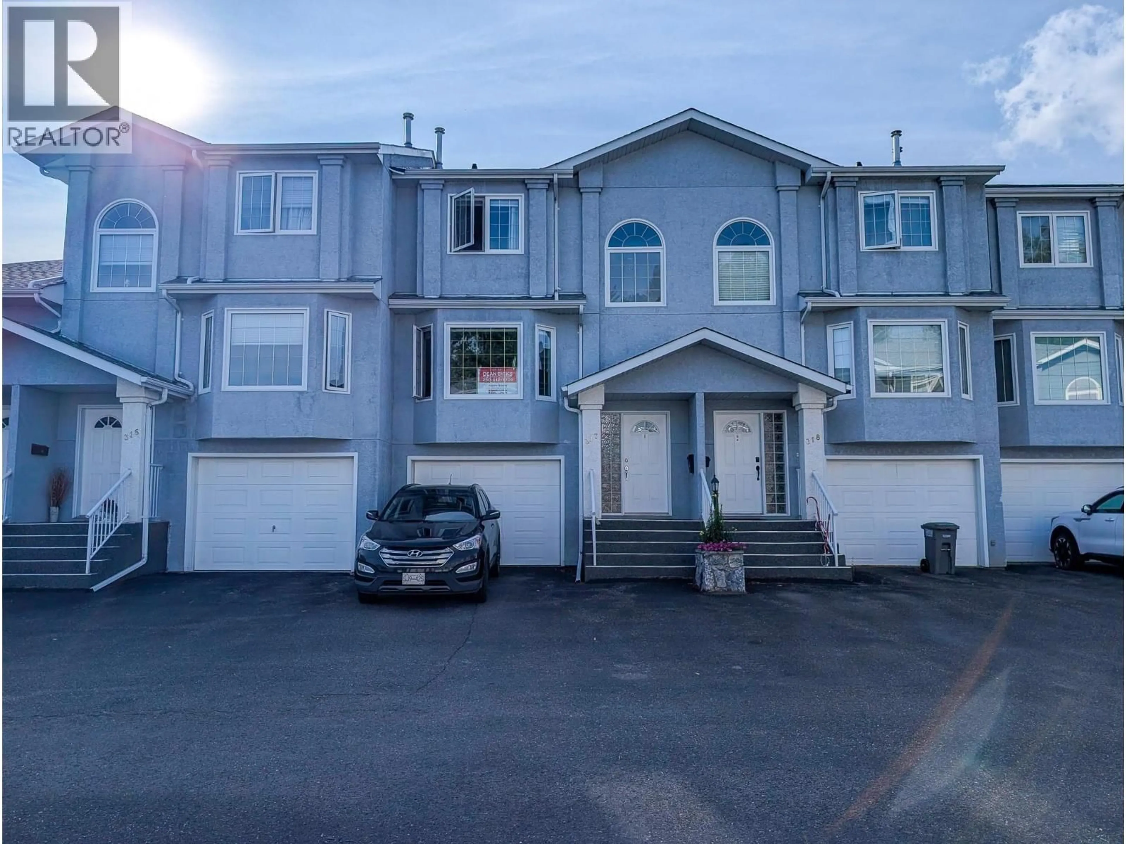 A pic from outside/outdoor area/front of a property/back of a property/a pic from drone, street for 317 - 6450 DAWSON ROAD, Prince George British Columbia V2K5Y4