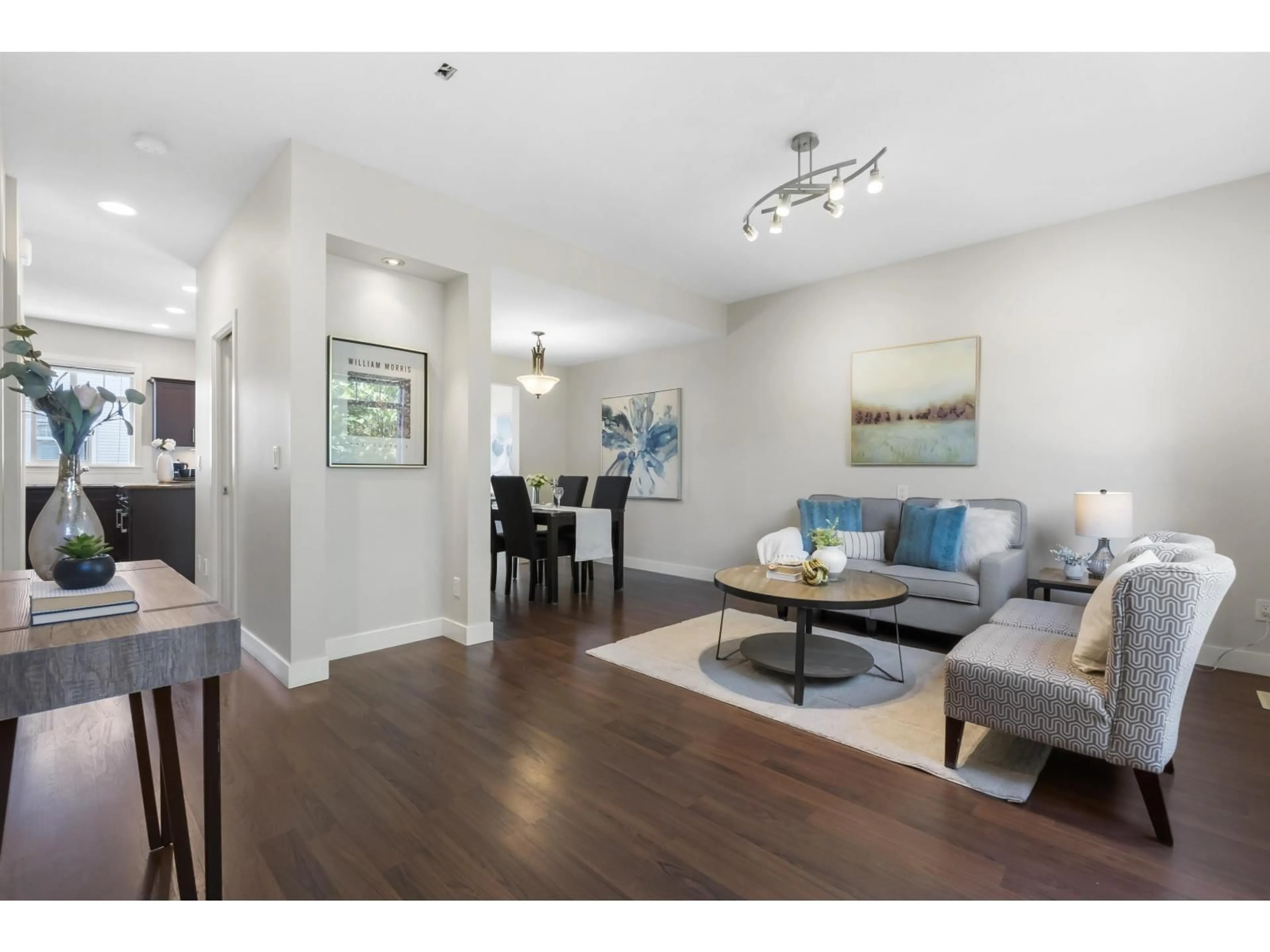 Living room with furniture, wood/laminate floor for 88 - 19551 66 AVENUE, Surrey British Columbia V4N0Z5