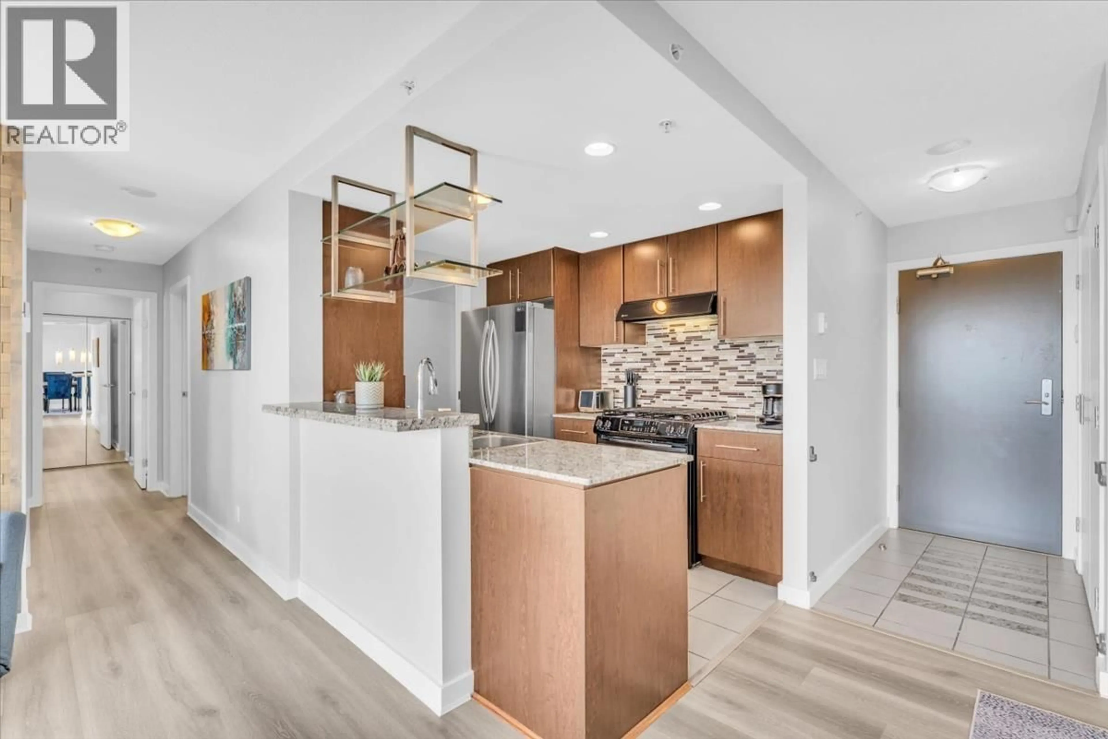 Open concept kitchen, ceramic/tile floor for 705 - 583 BEACH CRESCENT, Vancouver British Columbia V6Z3E6