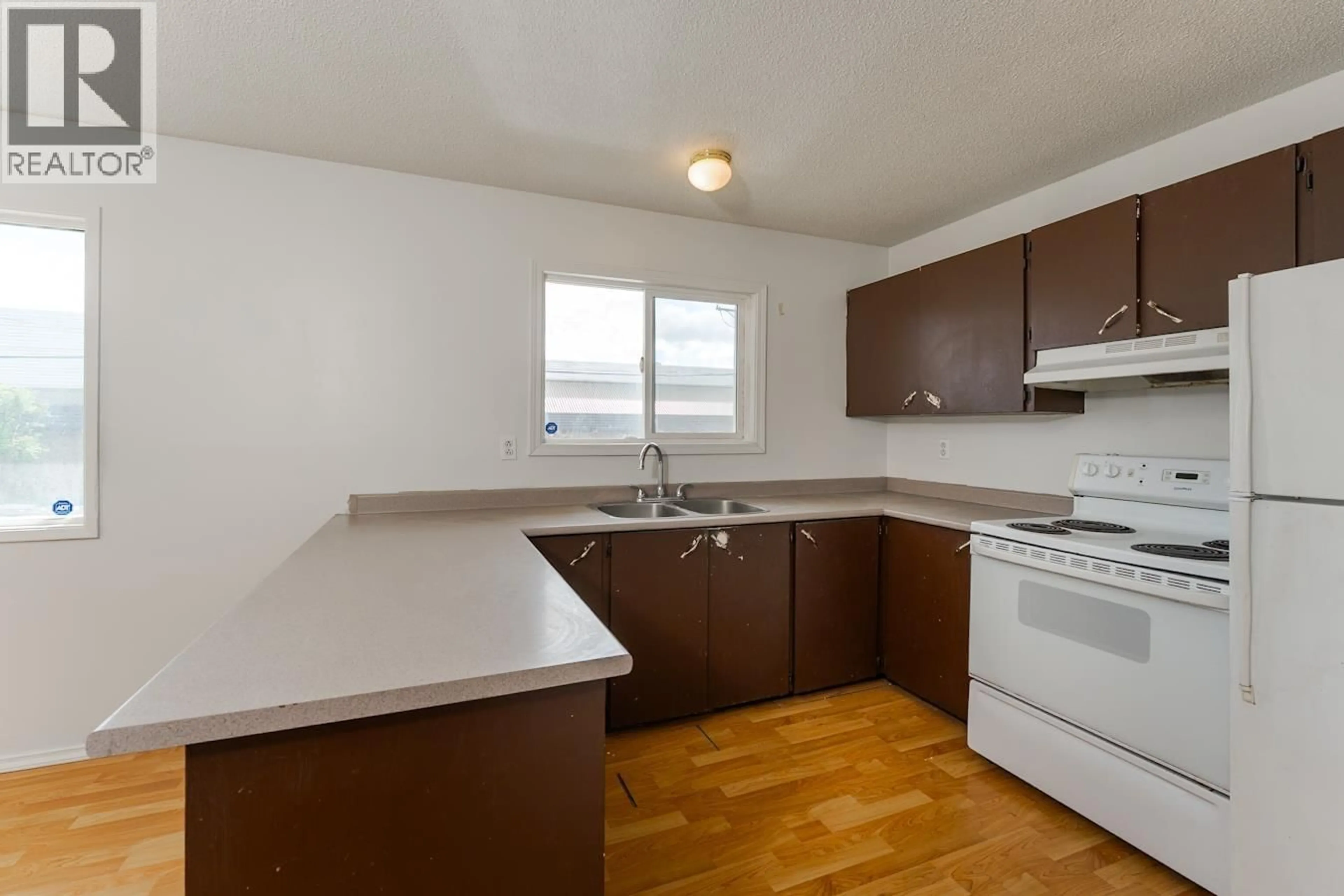 Standard kitchen, wood/laminate floor for 549 AHBAU STREET, Prince George British Columbia V2M3R8