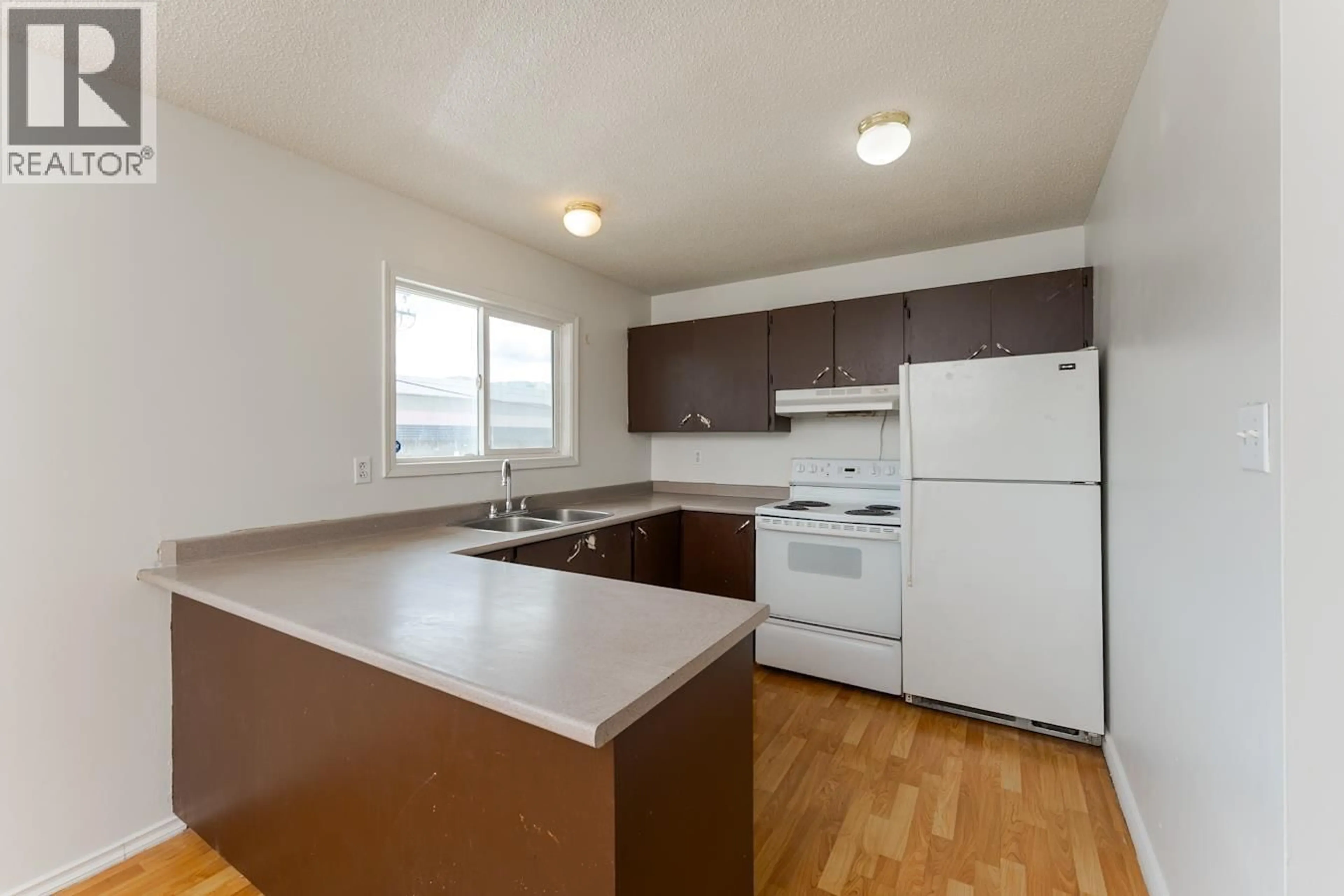 Standard kitchen, wood/laminate floor for 549 AHBAU STREET, Prince George British Columbia V2M3R8