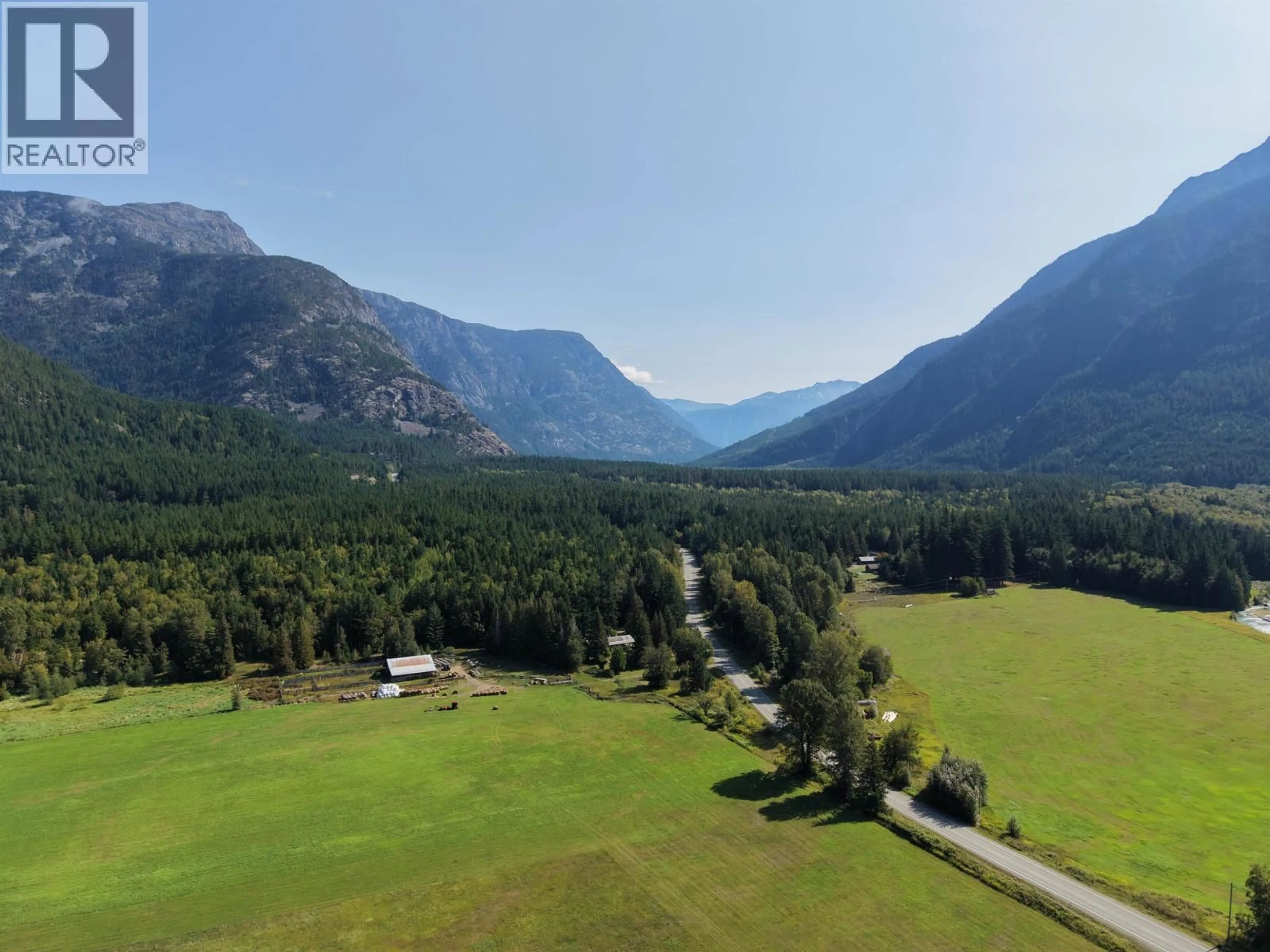 A pic from outside/outdoor area/front of a property/back of a property/a pic from drone, mountain view for SW 1/4 - 4892 MACKENZIE 20 HIGHWAY, Bella Coola British Columbia V0T1C0