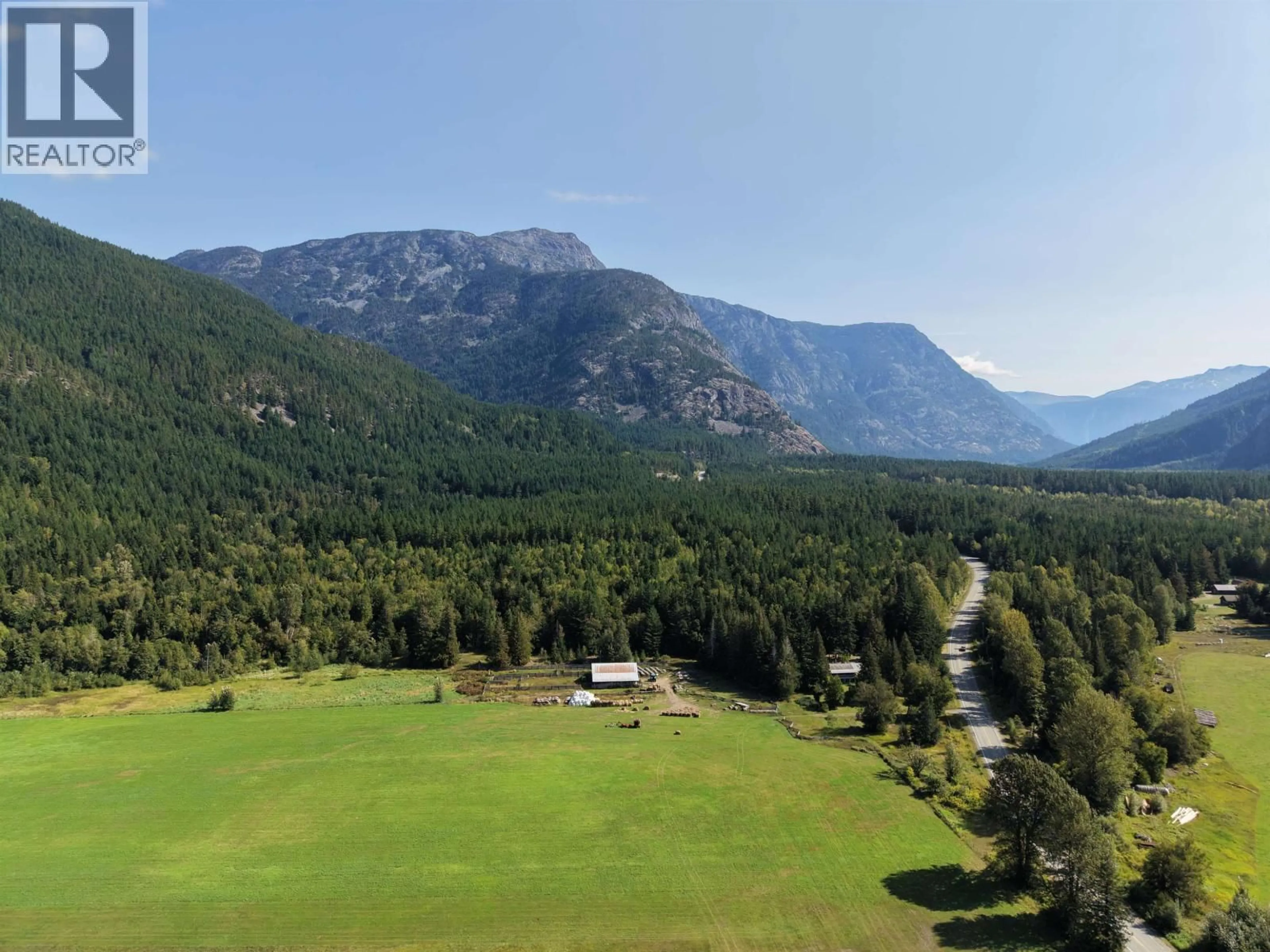 A pic from outside/outdoor area/front of a property/back of a property/a pic from drone, mountain view for SW 1/4 - 4892 MACKENZIE 20 HIGHWAY, Bella Coola British Columbia V0T1C0