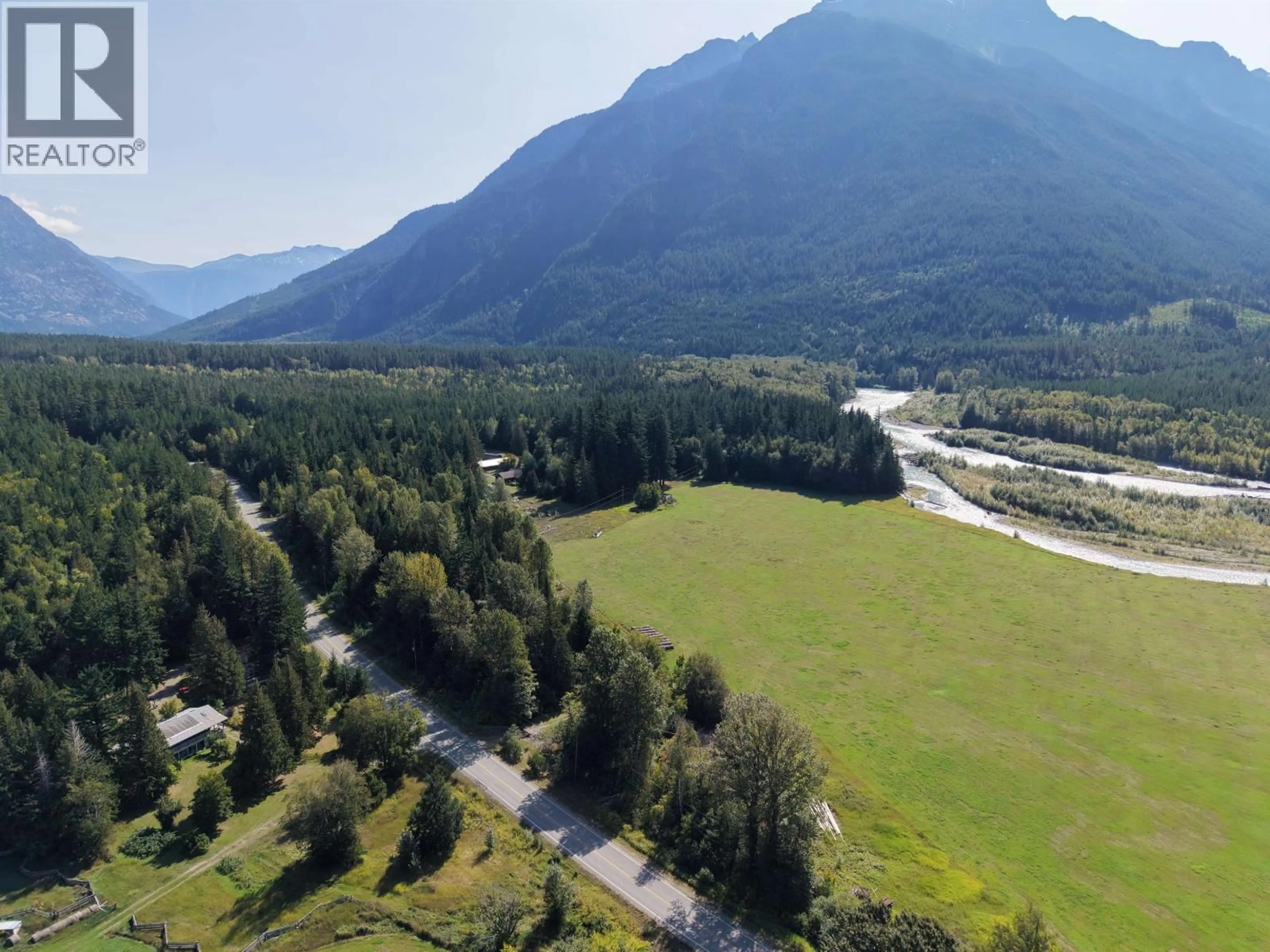 A pic from outside/outdoor area/front of a property/back of a property/a pic from drone, mountain view for SW 1/4 - 4892 MACKENZIE 20 HIGHWAY, Bella Coola British Columbia V0T1C0