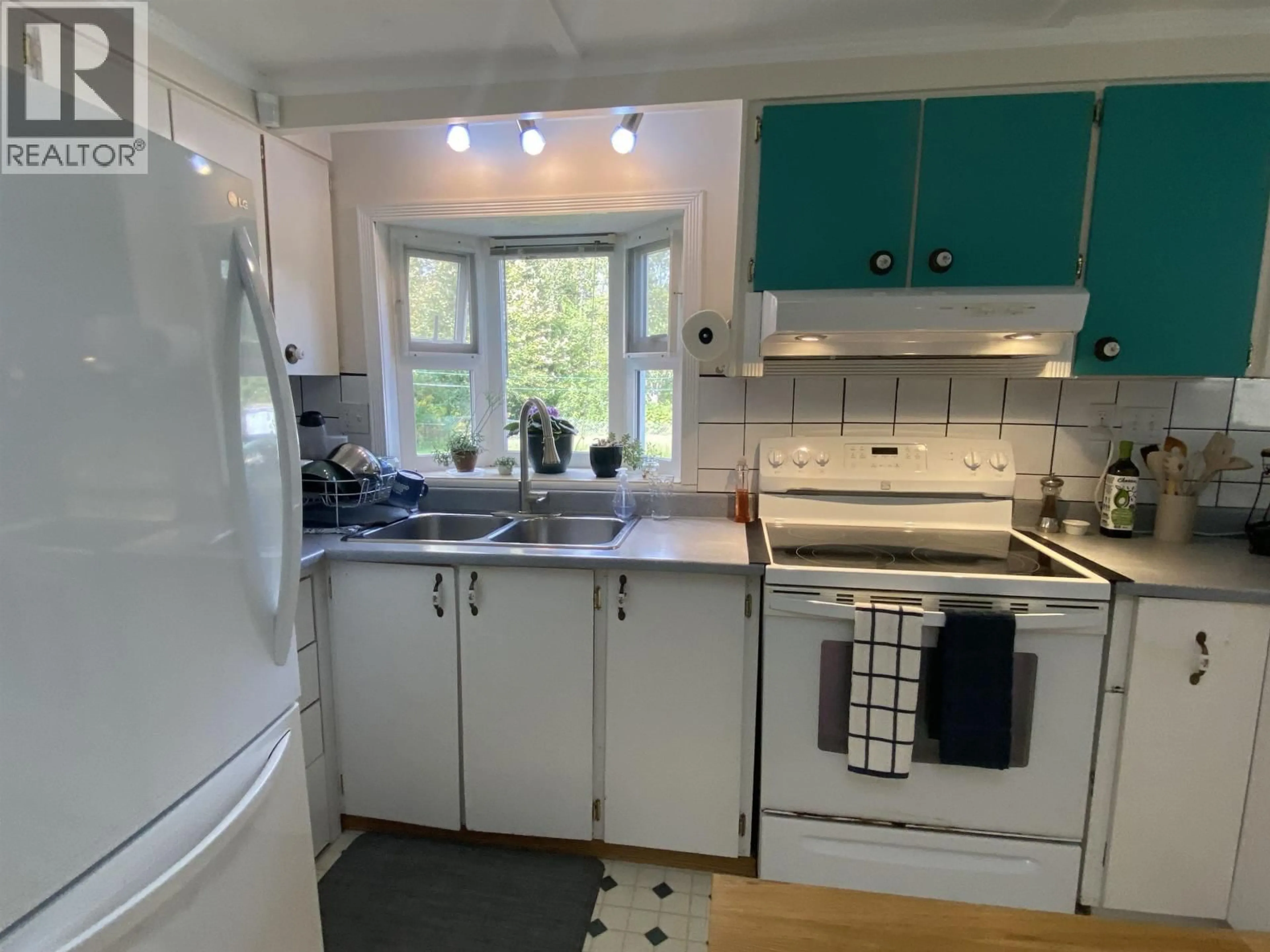 Standard kitchen, wood/laminate floor for 6234 NELSON ROAD, Terrace British Columbia V8G0E2