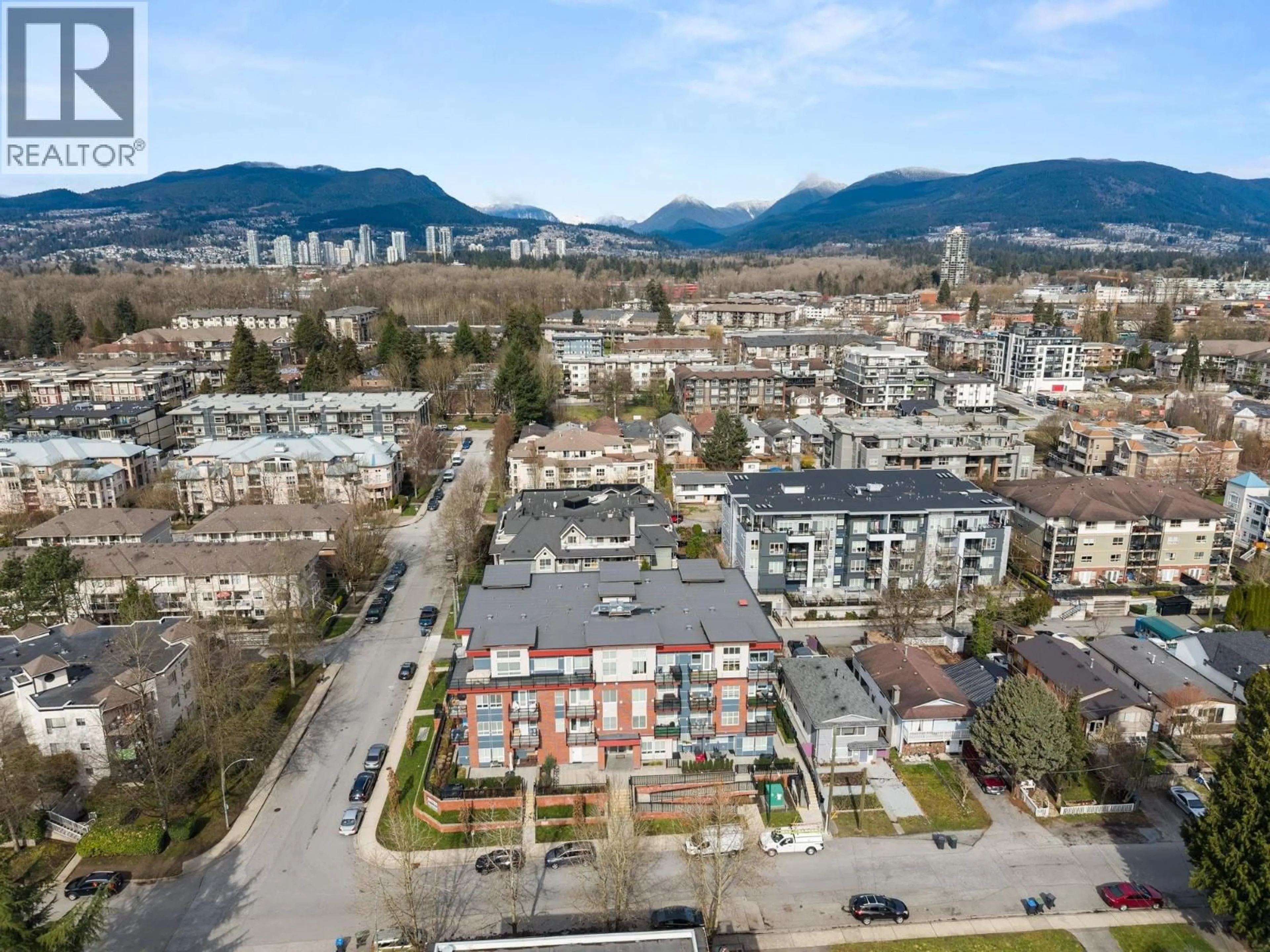 A pic from outside/outdoor area/front of a property/back of a property/a pic from drone, mountain view for 206 - 2389 HAWTHORNE AVENUE, Port Coquitlam British Columbia V3C0T2