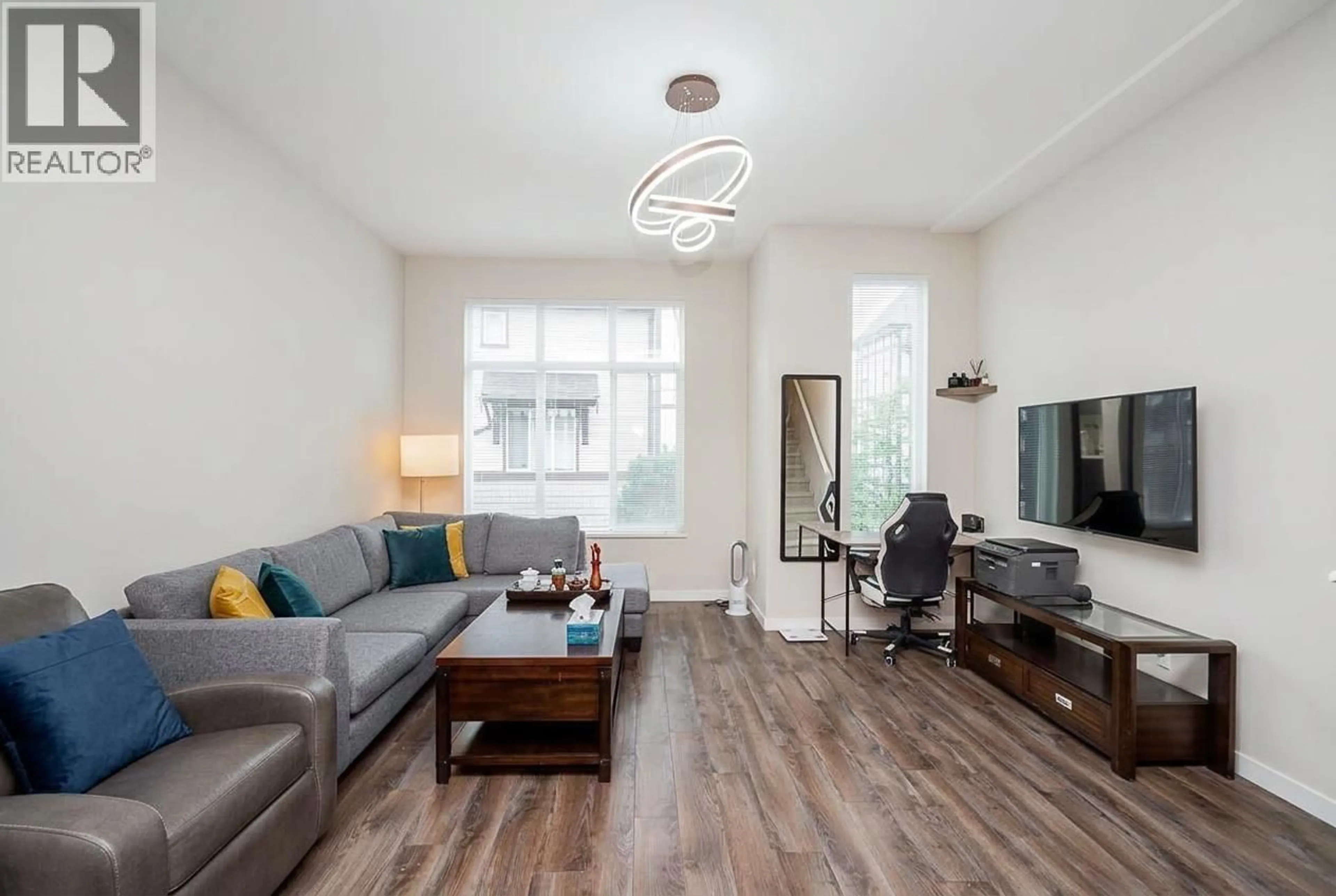 Living room with furniture, wood/laminate floor for 49 - 9728 ALEXANDRA ROAD, Richmond British Columbia V6X0M4