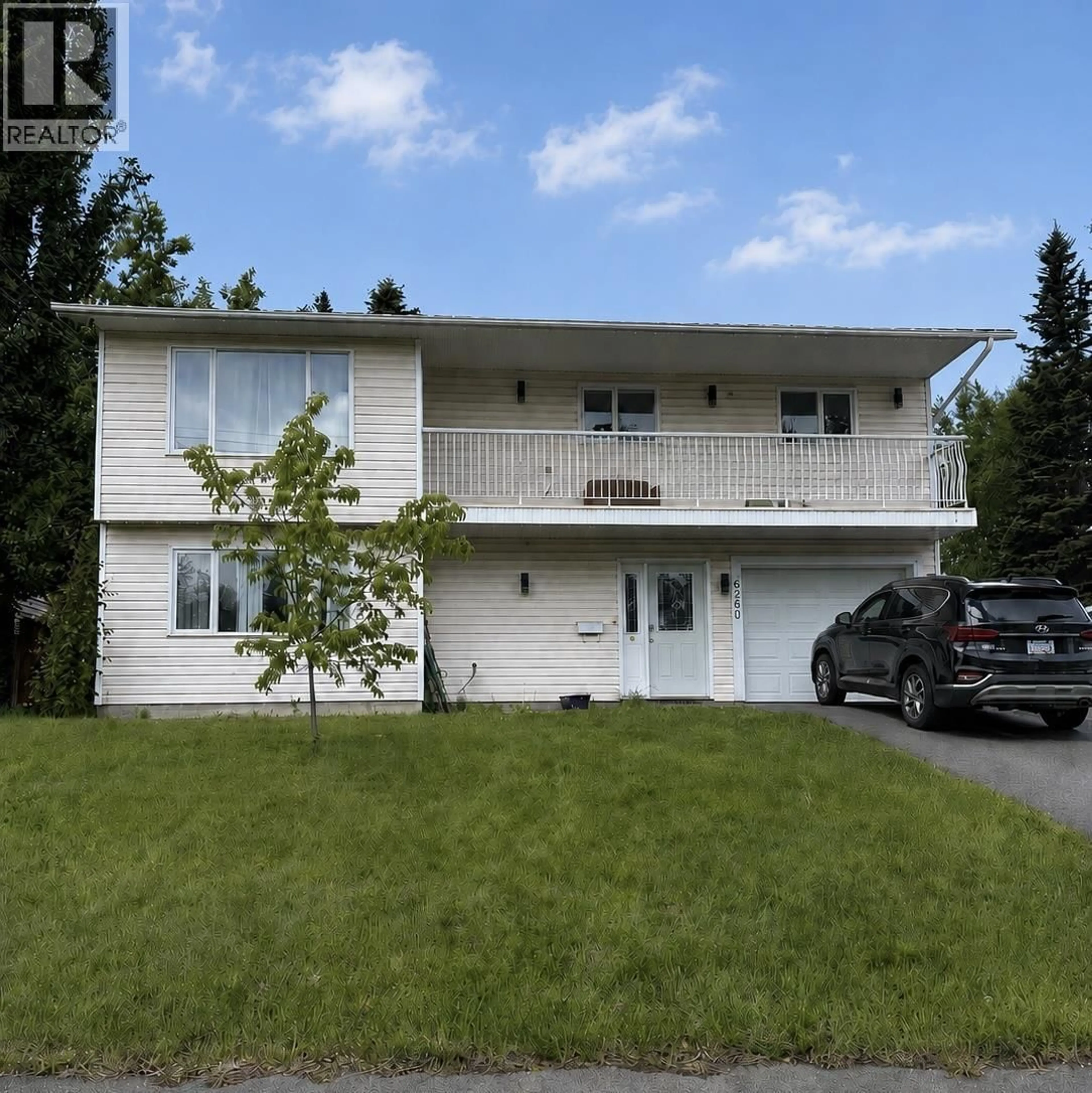 Home with vinyl exterior material, street for 6289 KELLY ROAD, Prince George British Columbia V2K2G5