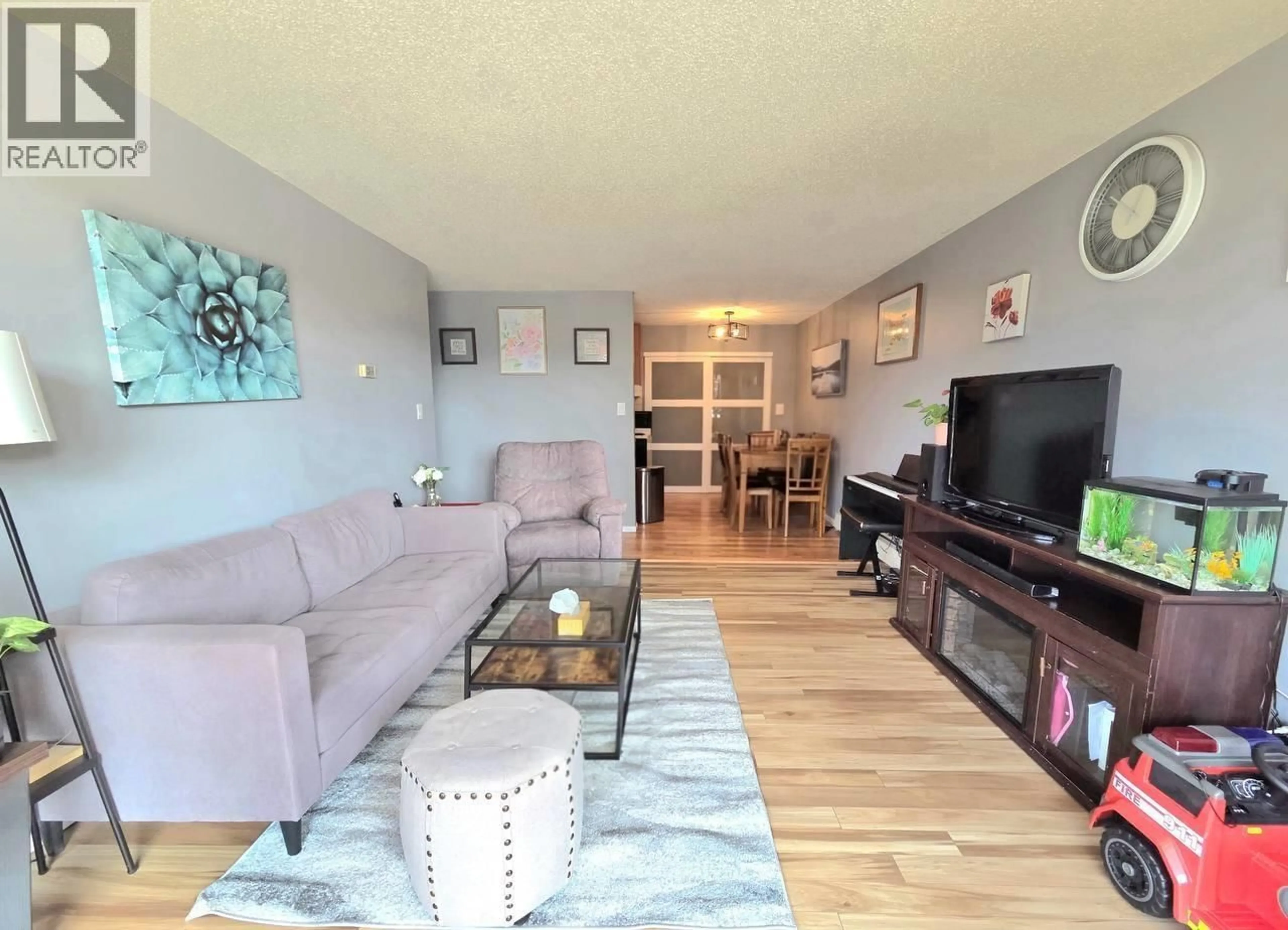 Living room with furniture, unknown for 107 - 170 3RD STREET, North Vancouver British Columbia V7L1E6