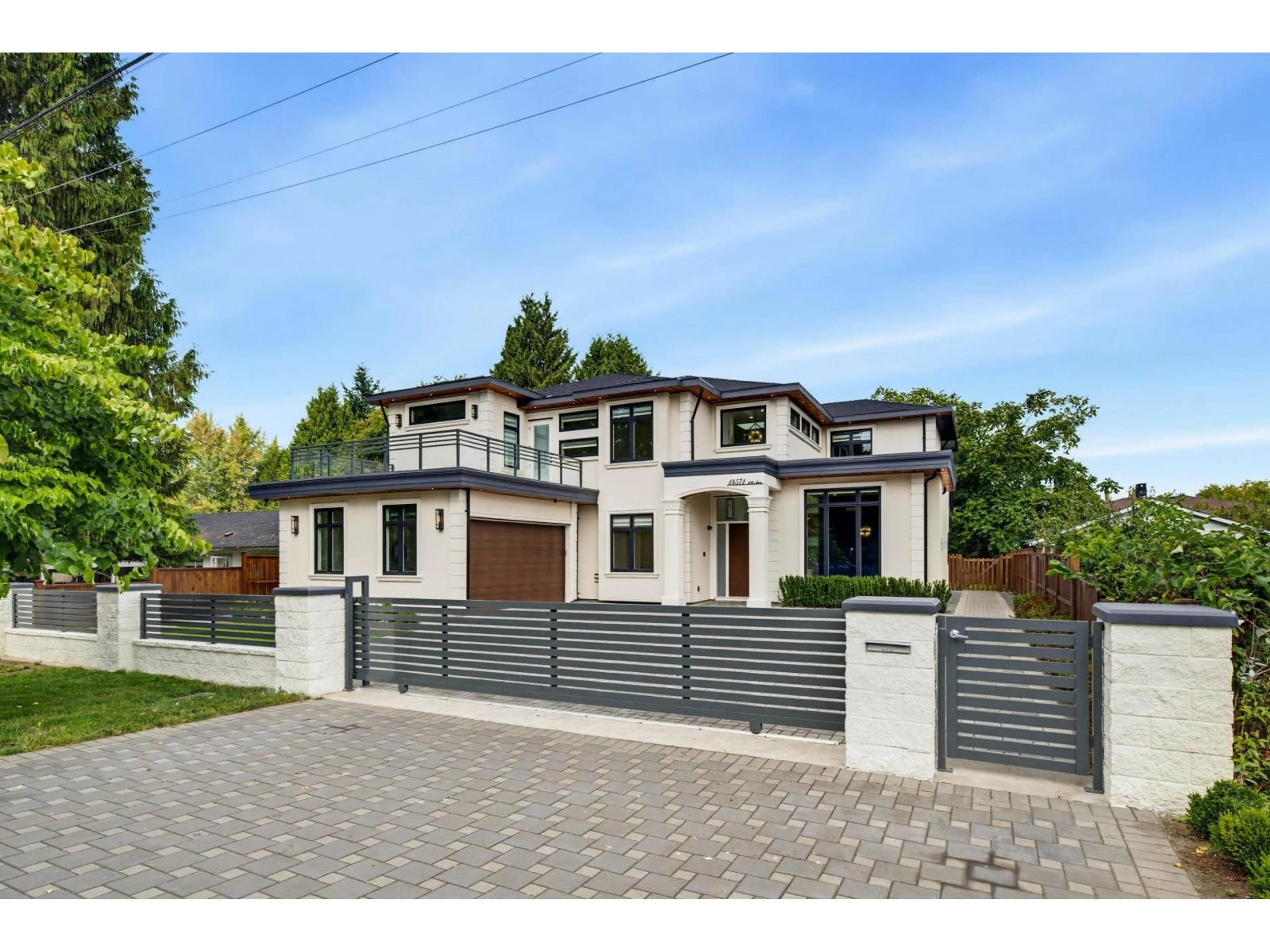Home with brick exterior material, street for 14571 106 AVENUE, Surrey British Columbia V3R1S9