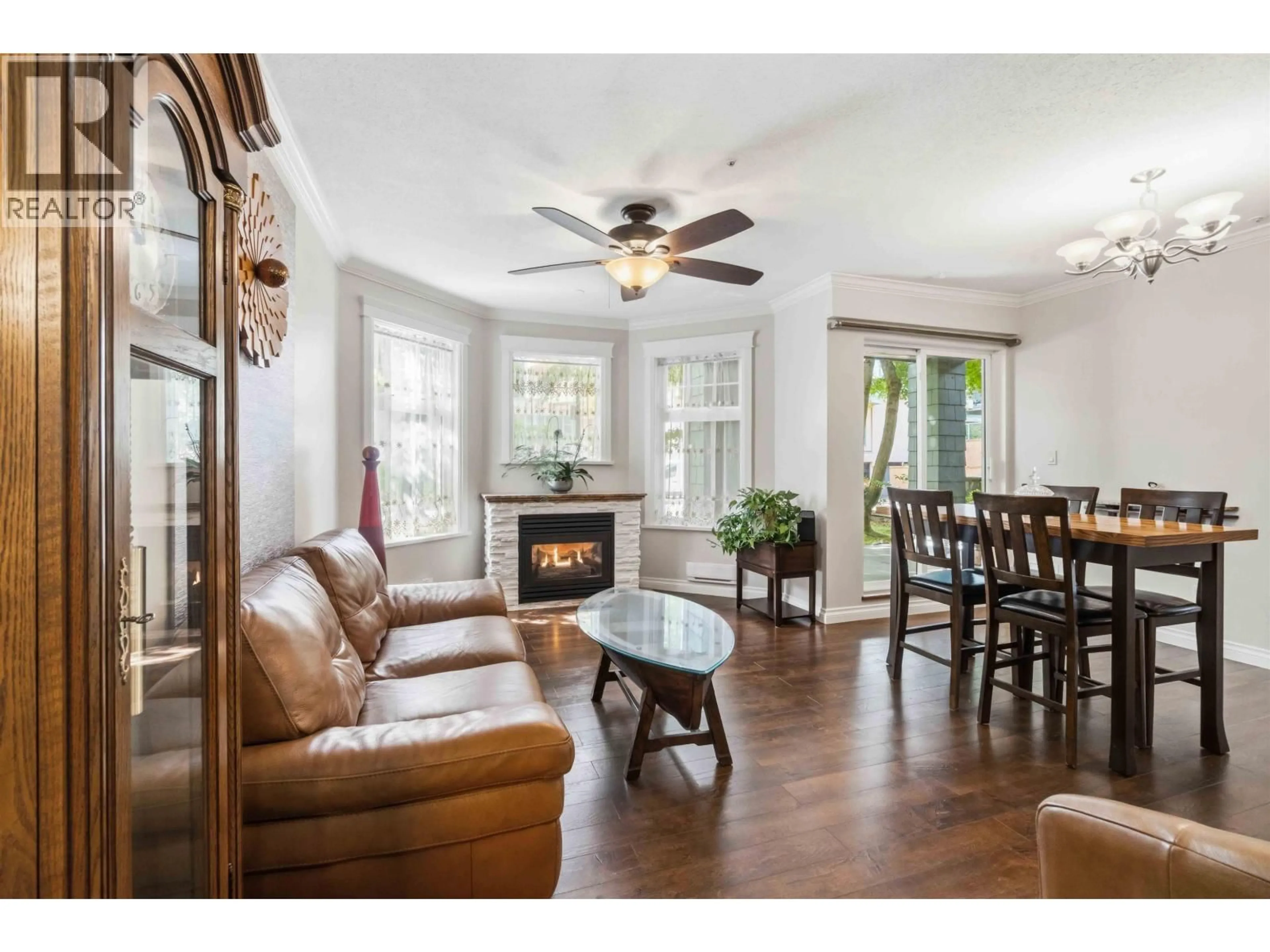 Living room with furniture, wood/laminate floor for G01 - 3085 PRIMROSE LANE, Coquitlam British Columbia V3B7S3