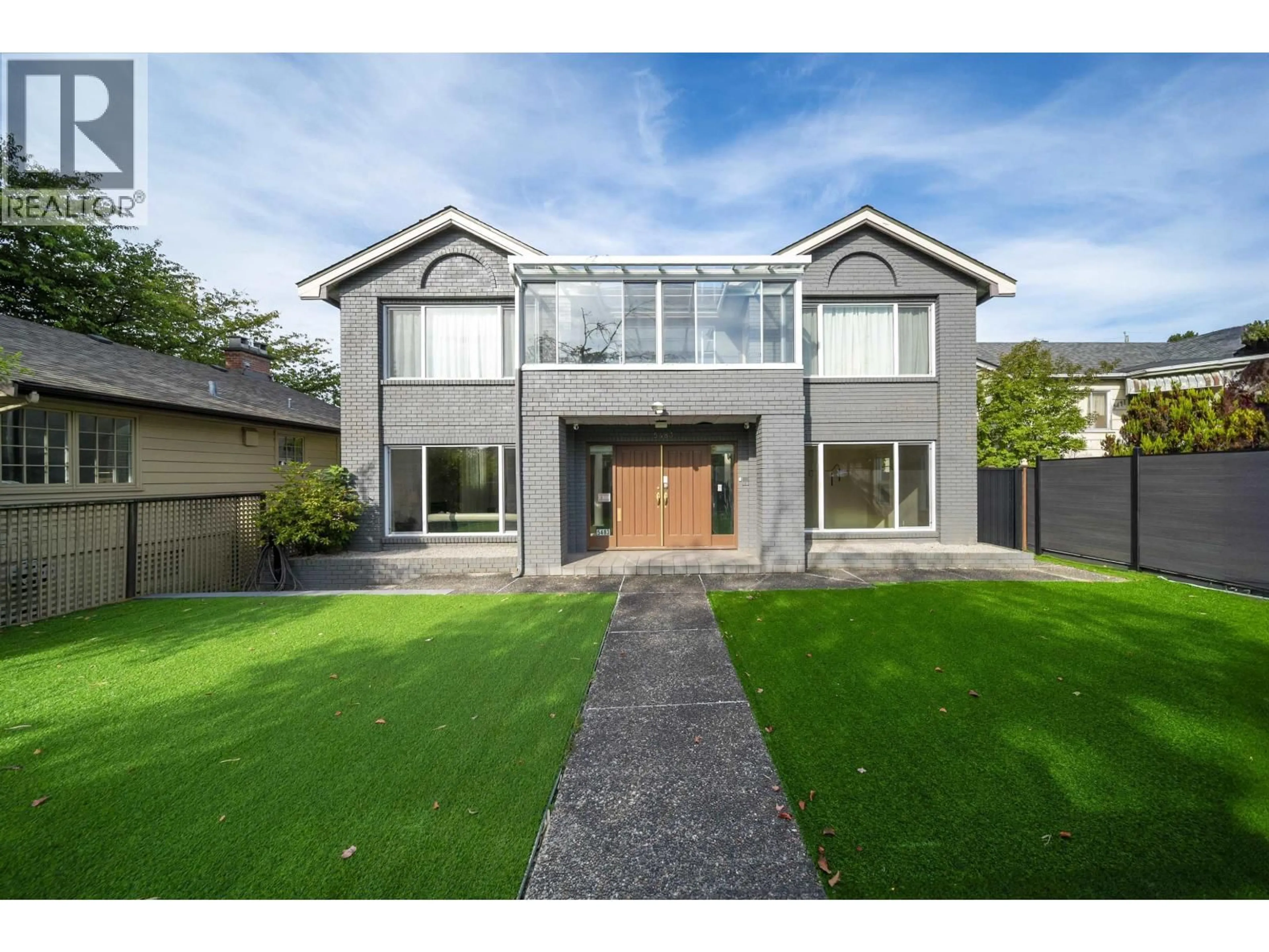 Home with brick exterior material, street for 5483 COLUMBIA STREET, Vancouver British Columbia V5Y3H4