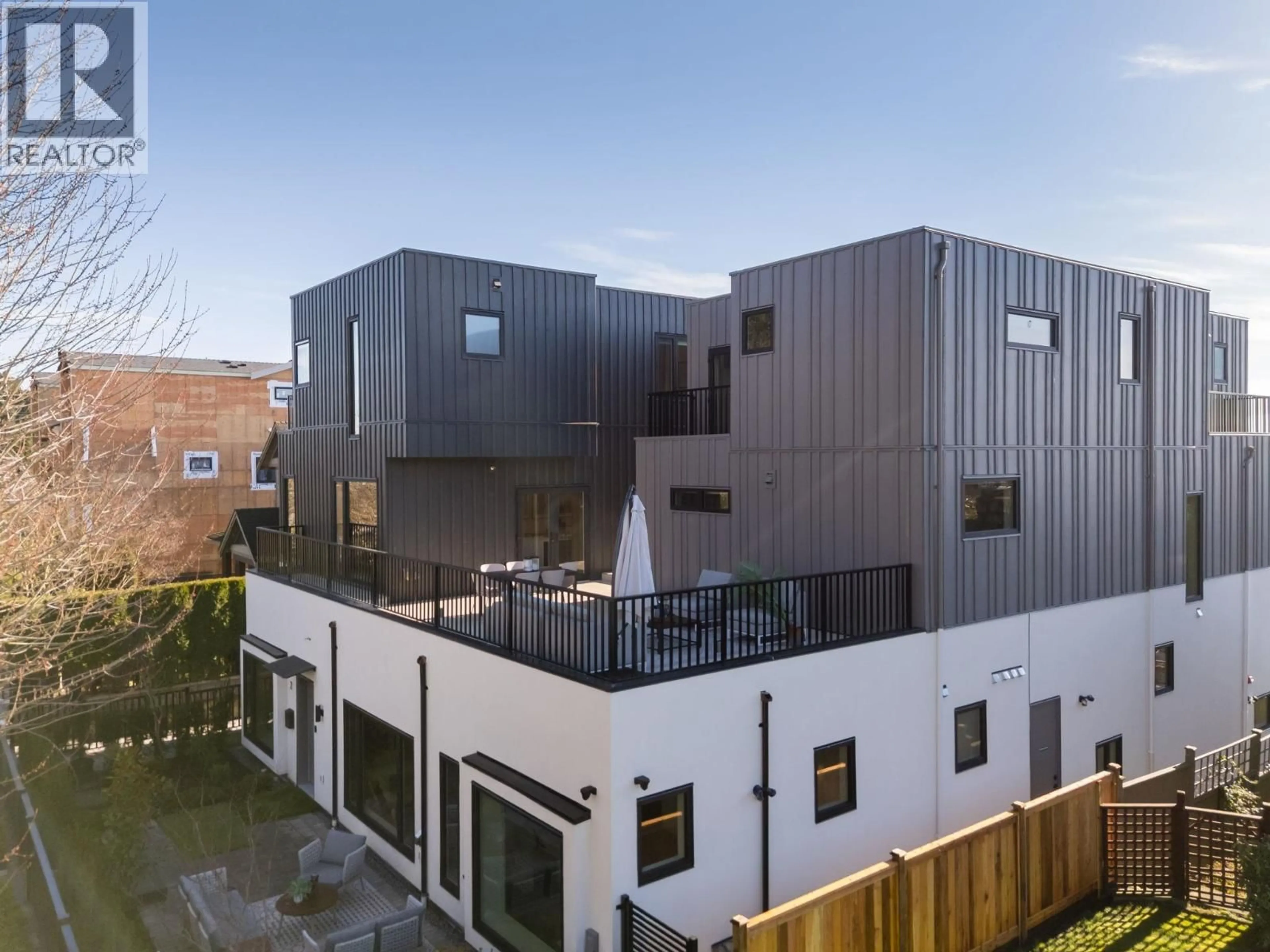 A pic from outside/outdoor area/front of a property/back of a property/a pic from drone, building for 3 - 950 57TH AVENUE, Vancouver British Columbia V6P1S3