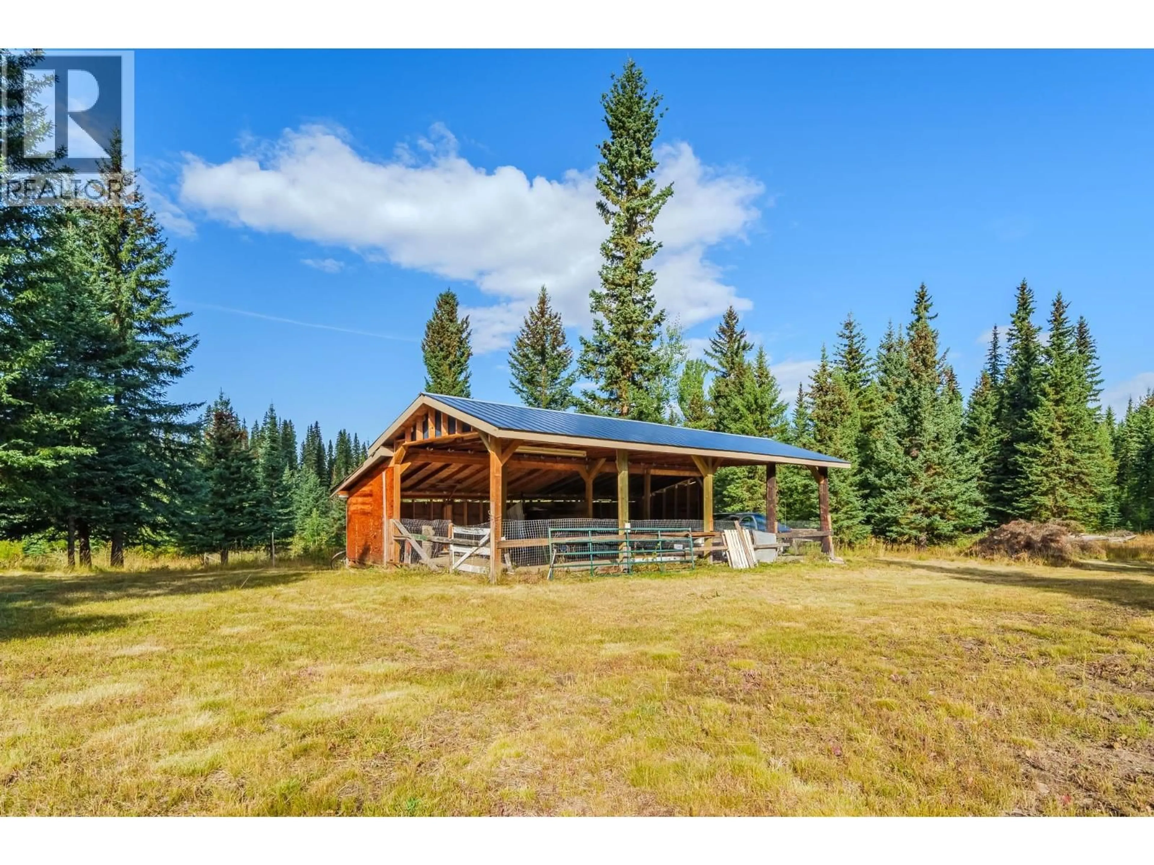 A pic from outside/outdoor area/front of a property/back of a property/a pic from drone, mountain view for 7778 MACHETE LAKE ROAD, Bridge Lake British Columbia V0K1E0