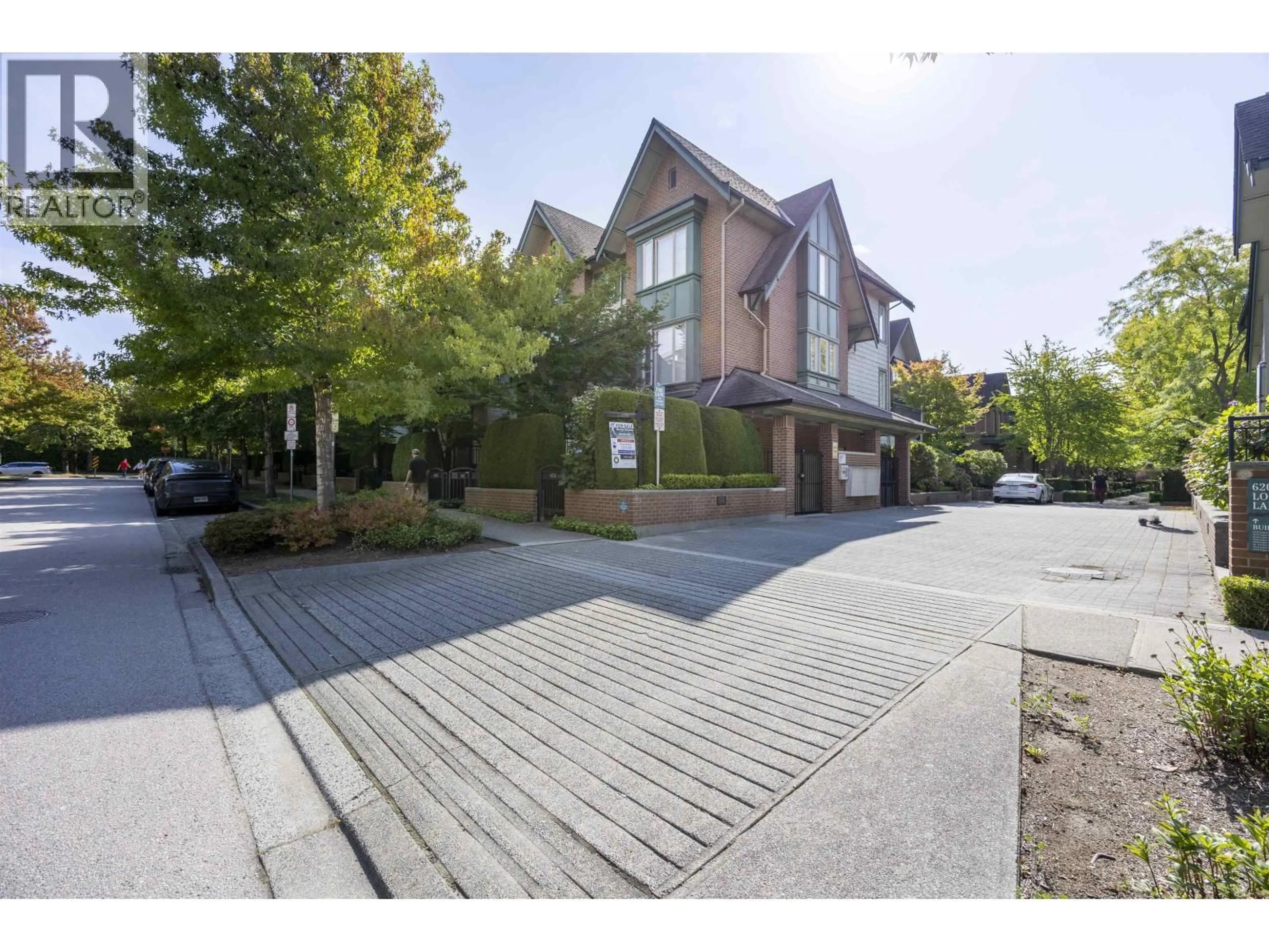 A pic from outside/outdoor area/front of a property/back of a property/a pic from drone, street for 6222 LOGAN LANE, Vancouver British Columbia V6T2K9