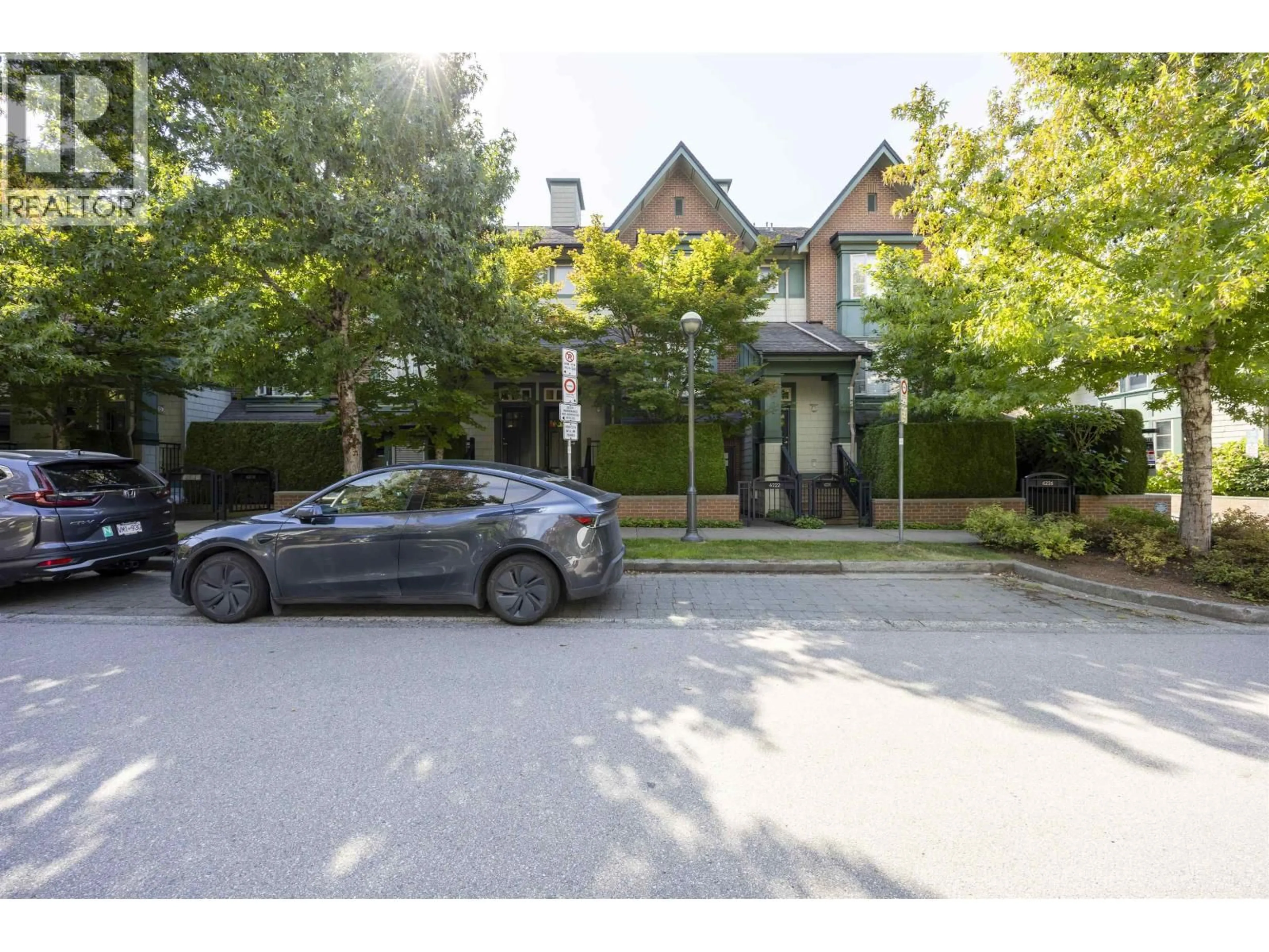 A pic from outside/outdoor area/front of a property/back of a property/a pic from drone, street for 6222 LOGAN LANE, Vancouver British Columbia V6T2K9