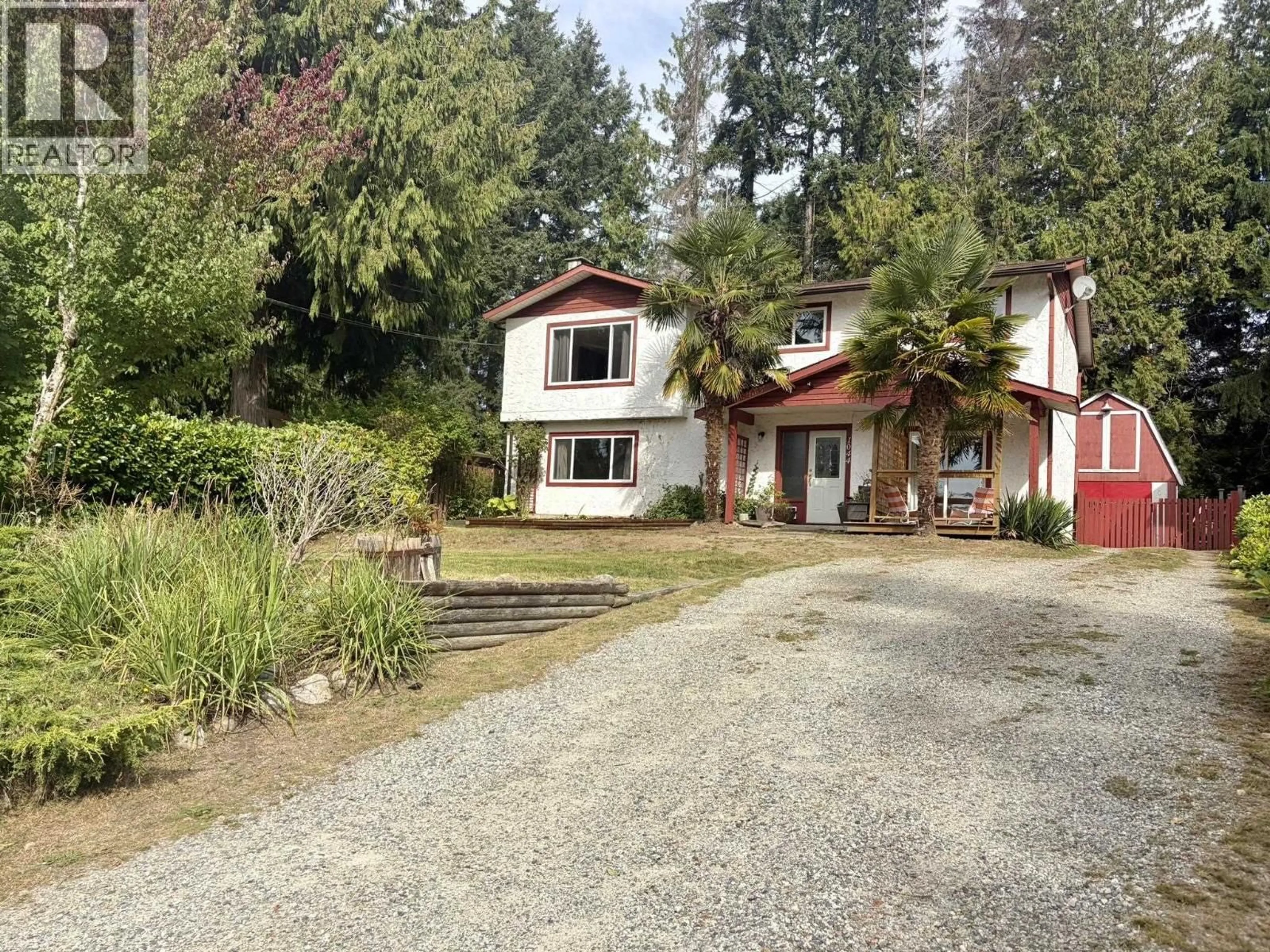 A pic from outside/outdoor area/front of a property/back of a property/a pic from drone, street for 1044 FIRCREST ROAD, Gibsons British Columbia V0N1V4