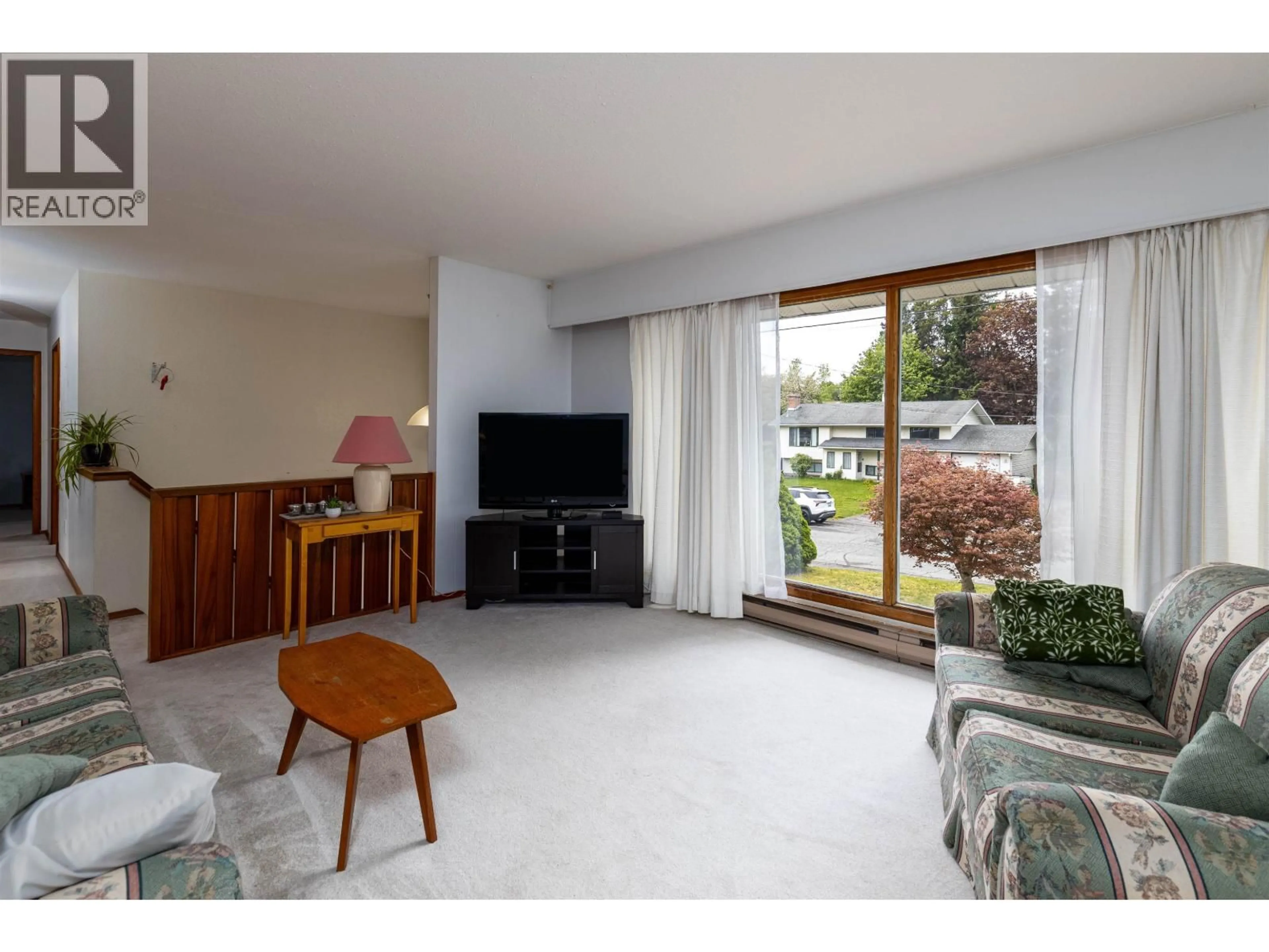 Living room with furniture, wood/laminate floor for 2214 EVERGREEN STREET, Terrace British Columbia V8G2P8