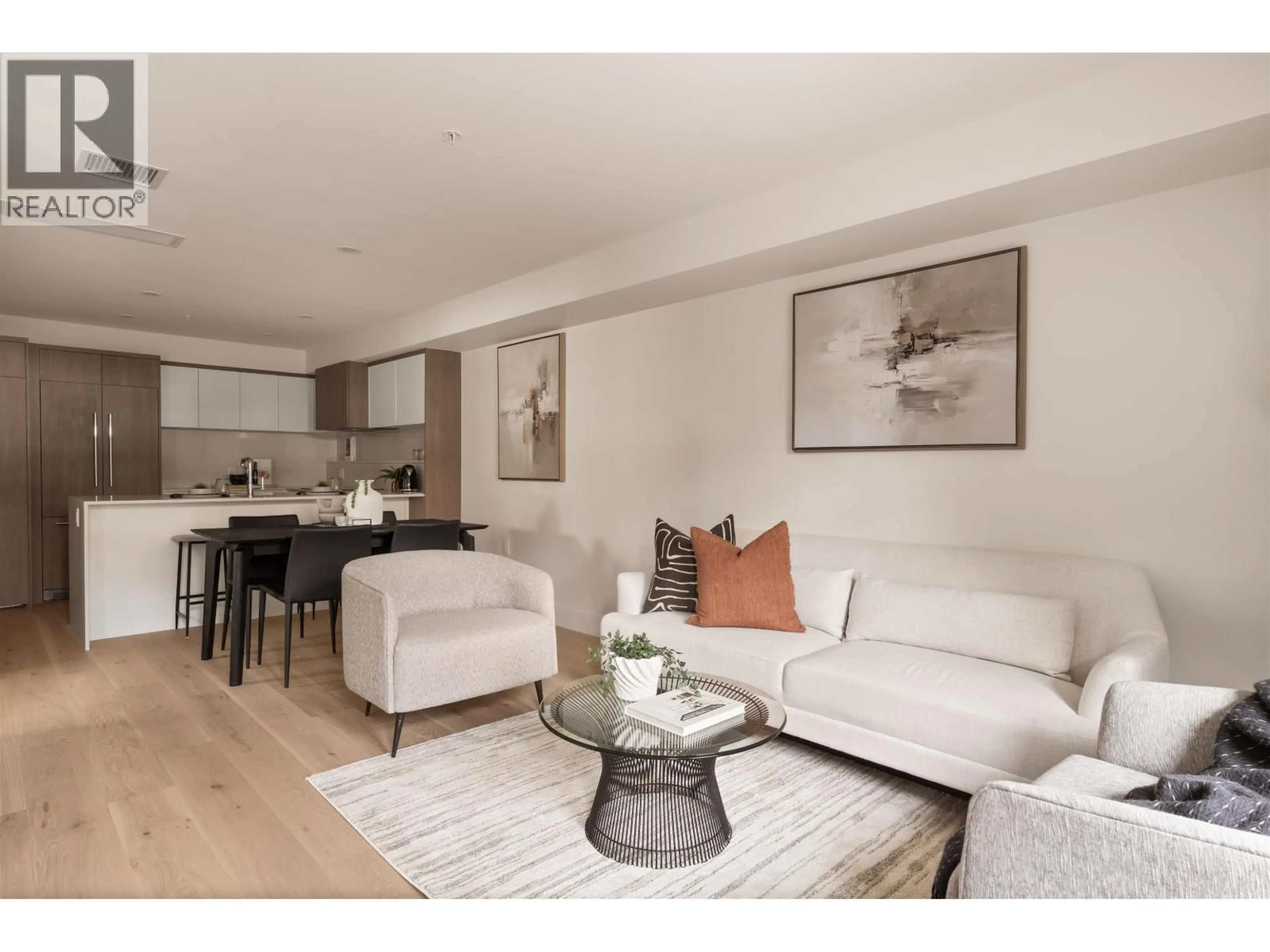 Living room with furniture, wood/laminate floor for 101 - 378 45TH AVENUE, Vancouver British Columbia V5Y0P6