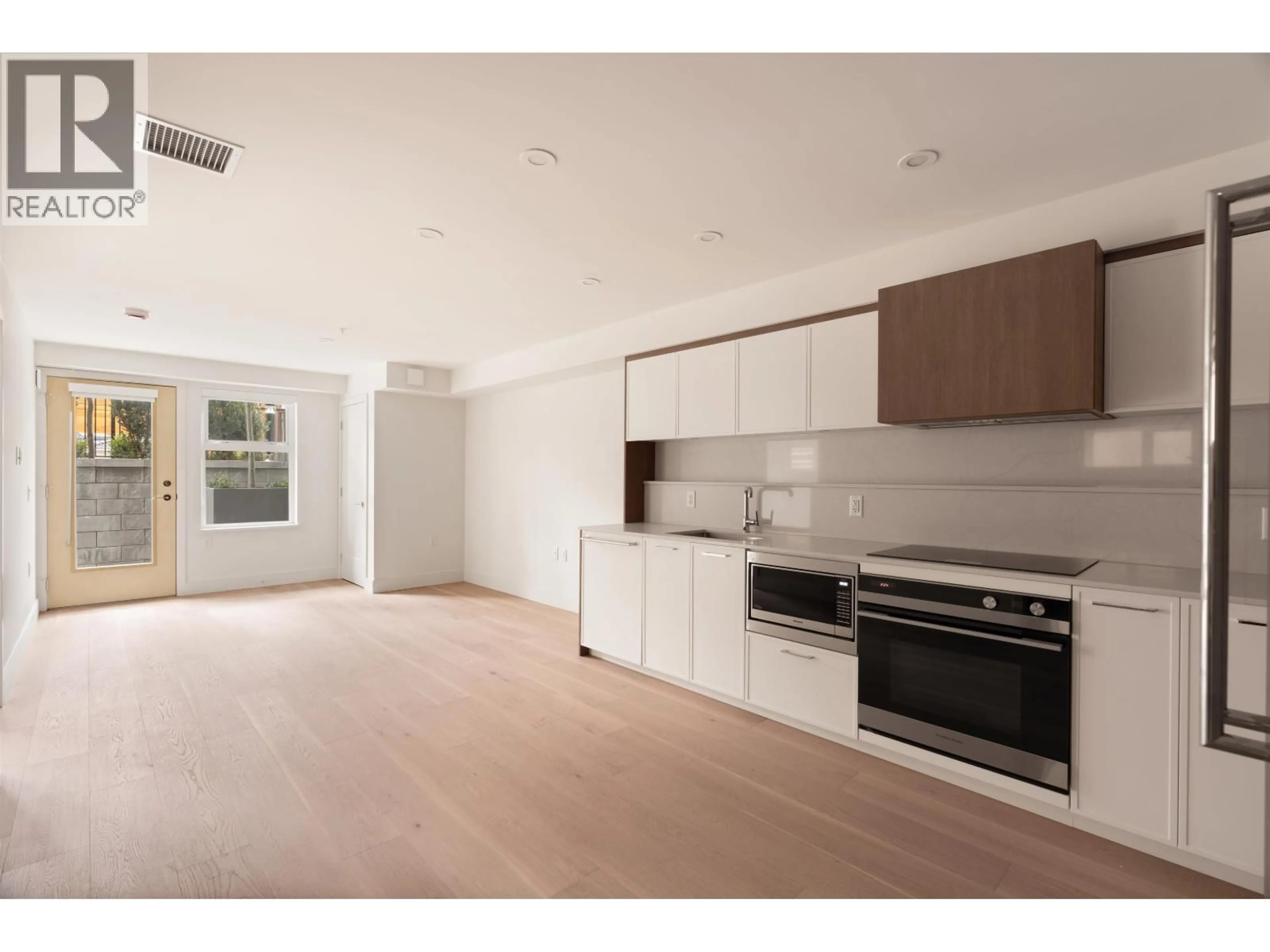 Open concept kitchen, unknown for 108 - 378 45TH AVENUE, Vancouver British Columbia V5Y0P6