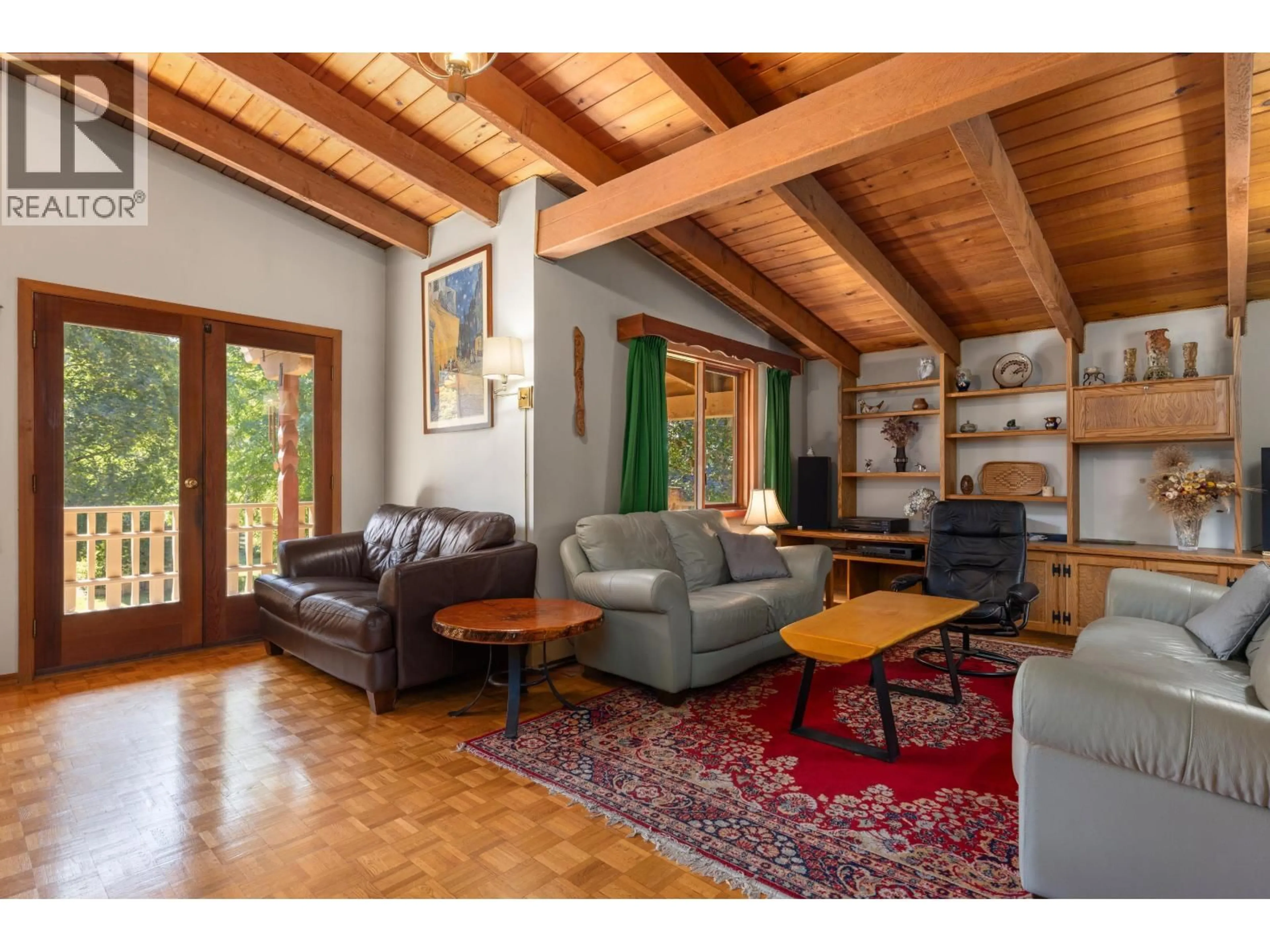 Living room with furniture, wood/laminate floor for 7869 PEMBERTON MEADOWS ROAD, Pemberton British Columbia V0N2L2