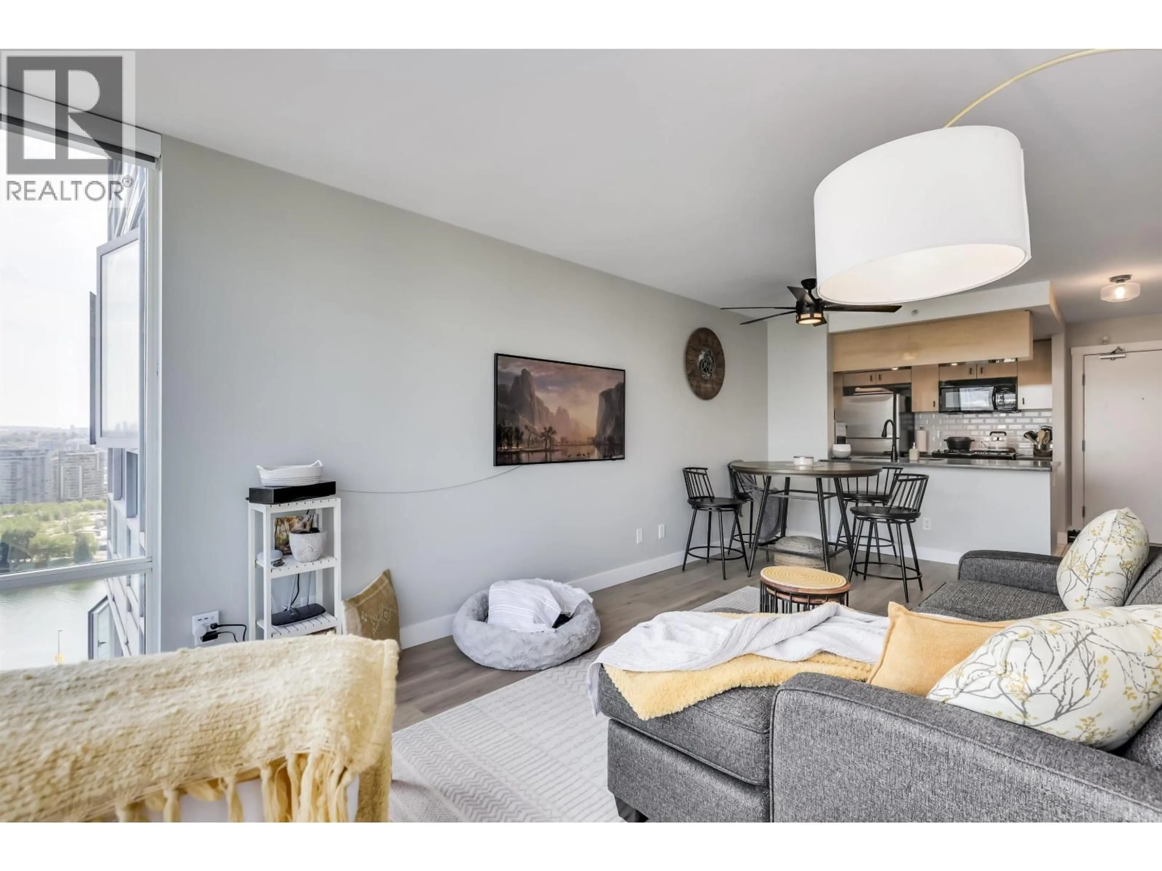 Living room with furniture, unknown for 2802 - 1033 MARINASIDE CRESCENT, Vancouver British Columbia V6Z3A3