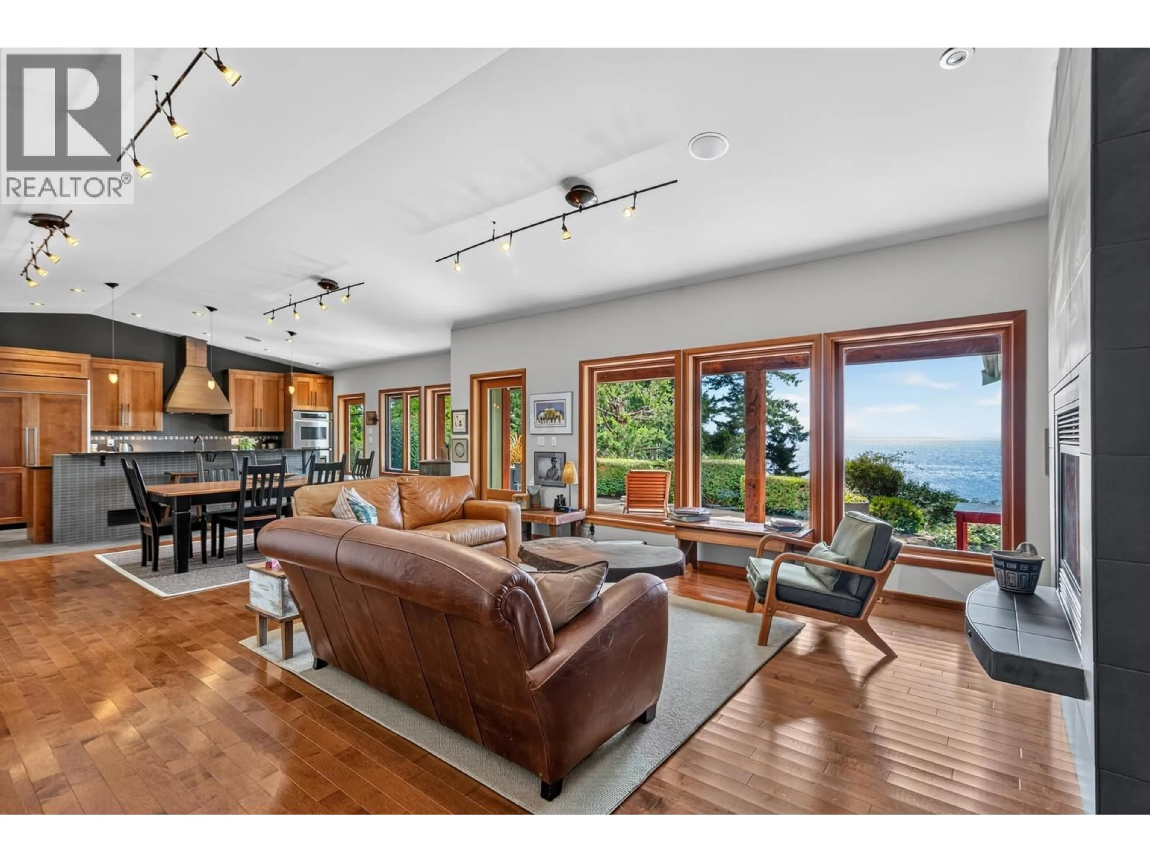 Living room with furniture, wood/laminate floor for 987 GOWER POINT ROAD, Gibsons British Columbia V0N1V3