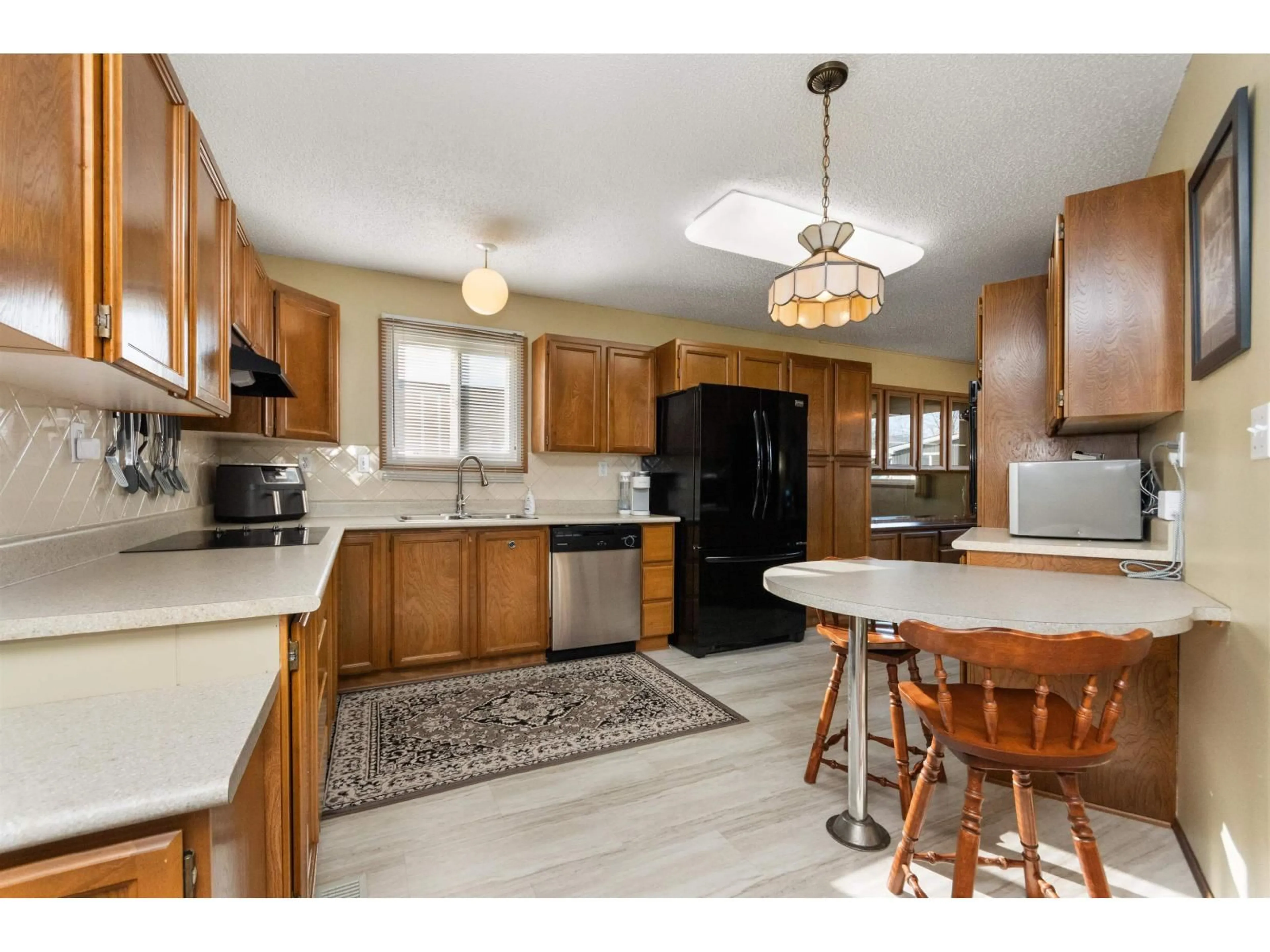 Open concept kitchen, unknown for 137 - 6338 VEDDER ROAD, Chilliwack British Columbia V2R3R4
