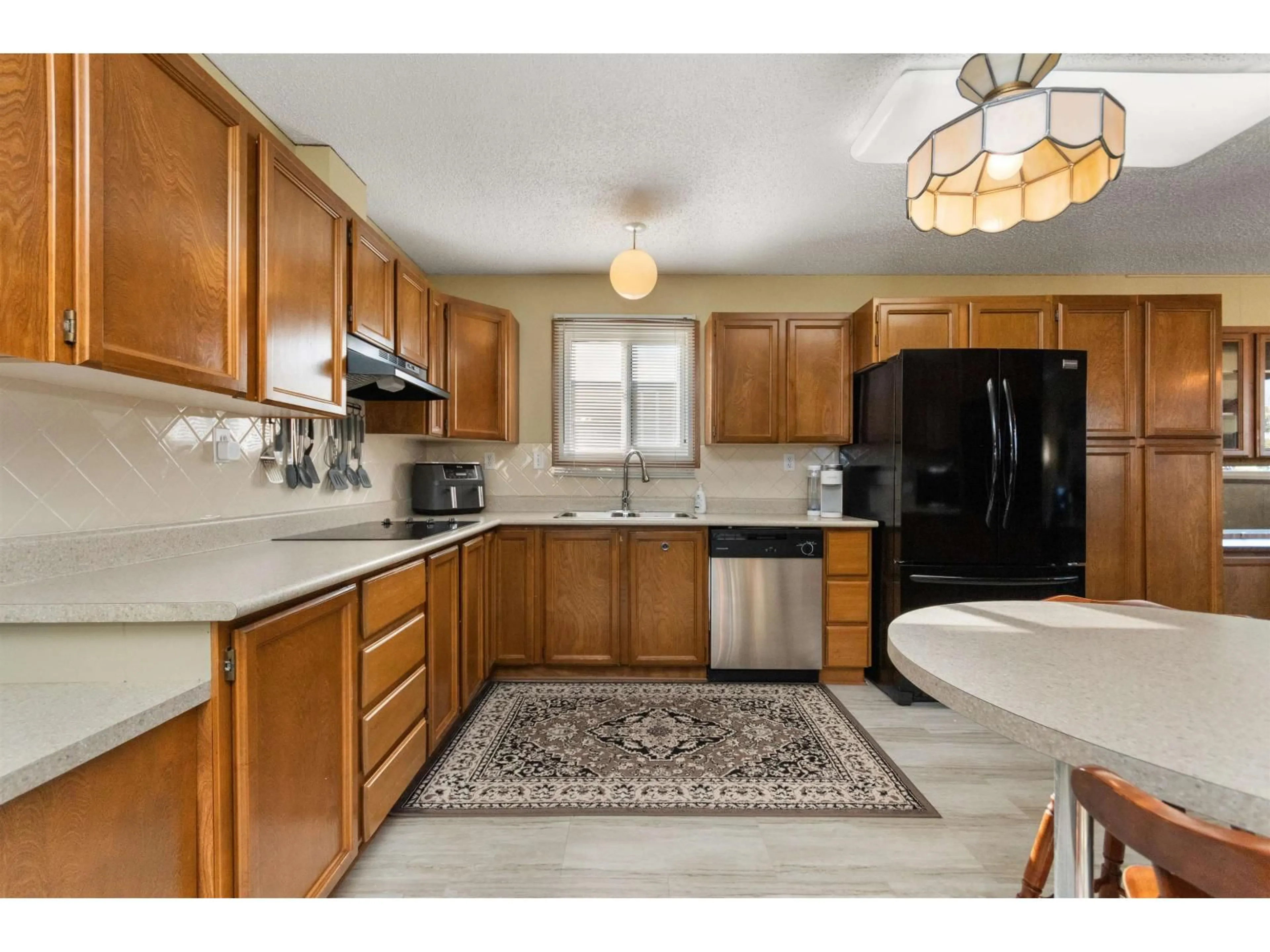 Standard kitchen, ceramic/tile floor for 137 - 6338 VEDDER ROAD, Chilliwack British Columbia V2R3R4