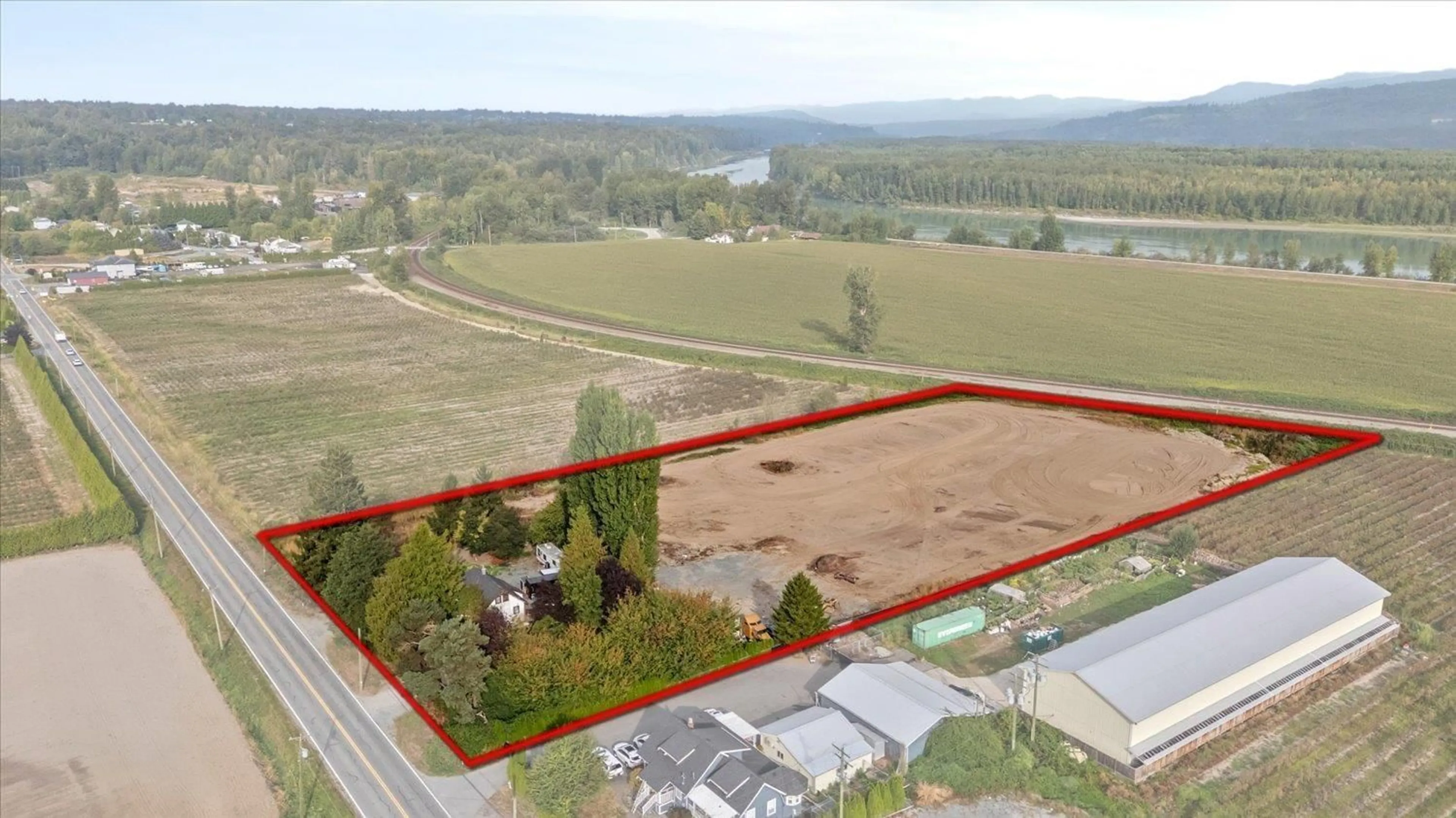 A pic from outside/outdoor area/front of a property/back of a property/a pic from drone, water/lake/river/ocean view for 32219 HARRIS ROAD, Abbotsford British Columbia V4X1W1