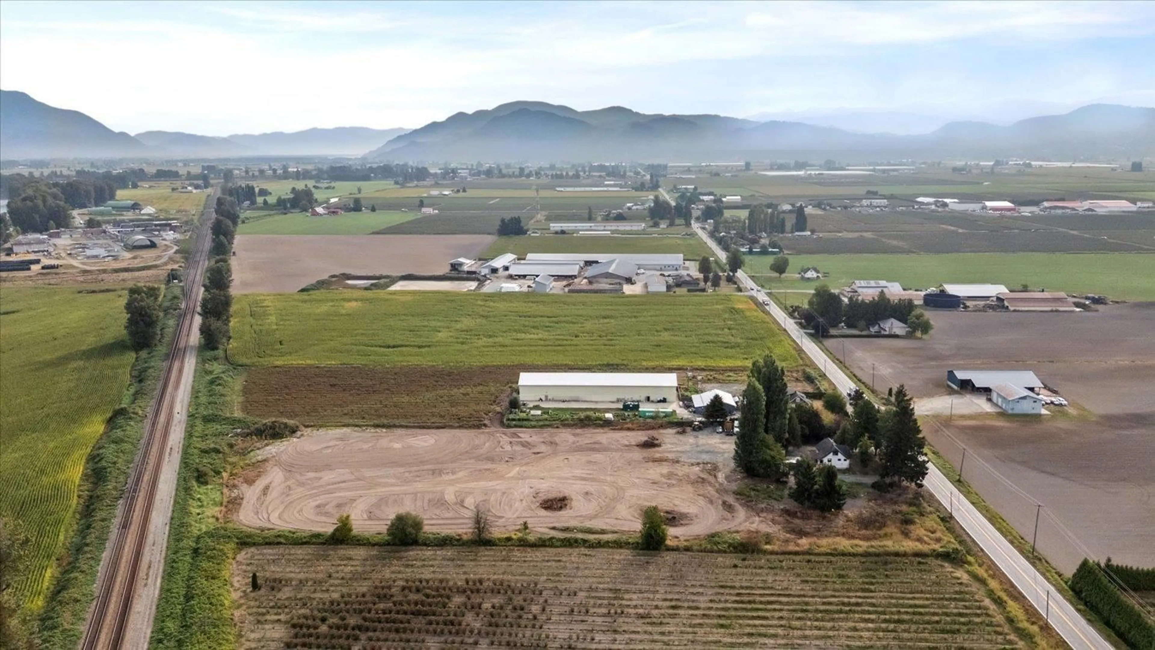 A pic from outside/outdoor area/front of a property/back of a property/a pic from drone, mountain view for 32219 HARRIS ROAD, Abbotsford British Columbia V4X1W1