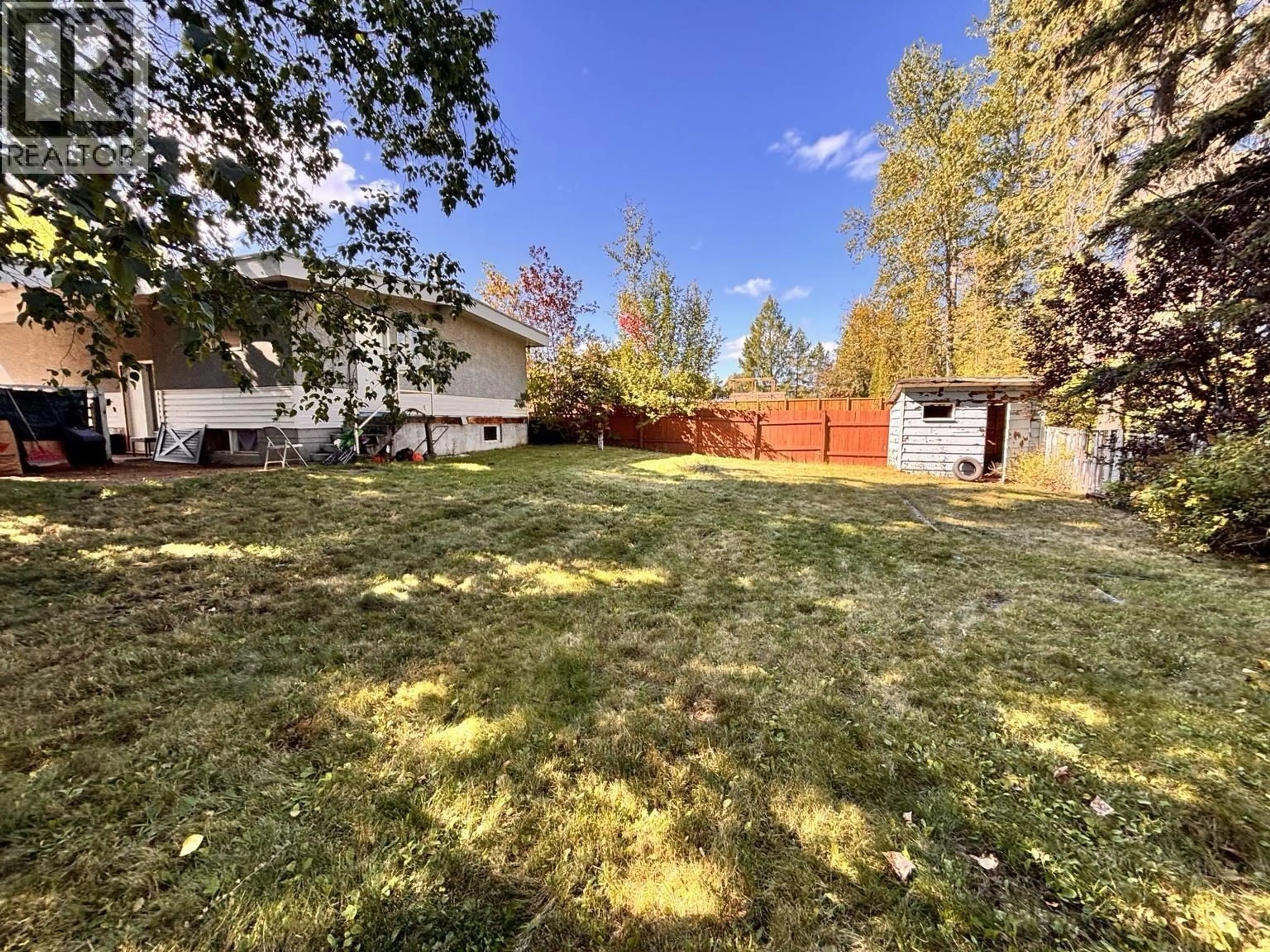 A pic from outside/outdoor area/front of a property/back of a property/a pic from drone, forest/trees view for 404 MCINNIS AVENUE, Prince George British Columbia V2N1Y7